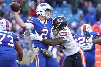 BUFFALO, NY - NOVEMBER 04: Nathan Peterman #2 of the Buffalo Bills is hit as he throws by Danny Trevathan #59 of the Chicago Bears in the fourth quarter during NFL game action at New Era Field on November 4, 2018 in Buffalo, New York. (Photo by Tom Szczer