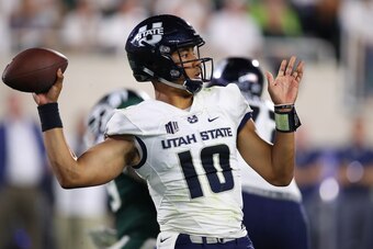 EAST LANSING, MI - AUGUST 31: Jordan Love #10 of the Utah State Aggies throws a second half pass while playing the Michigan State Spartans at Spartan Stadium on August 31, 2018 in East Lansing, Michigan. Michigan State won the game 38-31. (Photo by Gregor