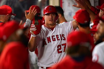ANAHEIM, CA - SEPTEMBER 25:  Mike Trout #27 of the Los Angeles Angels of Anaheim celebrates during the game against the Texas Rangers at Angel Stadium on September 25, 2018 in Anaheim, California.  (Photo by Masterpress/Getty Images)