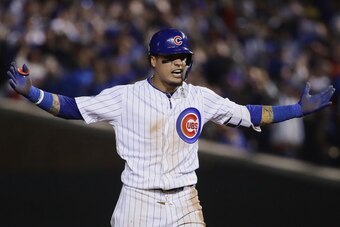 CHICAGO, IL - OCTOBER 02:  Javier Baez #9 of the Chicago Cubs celebrates after hitting a RBI double in the eighth inning against the Colorado Rockies to score Terrance Gore #1 (not pictured) during the National League Wild Card Game at Wrigley Field on Oc