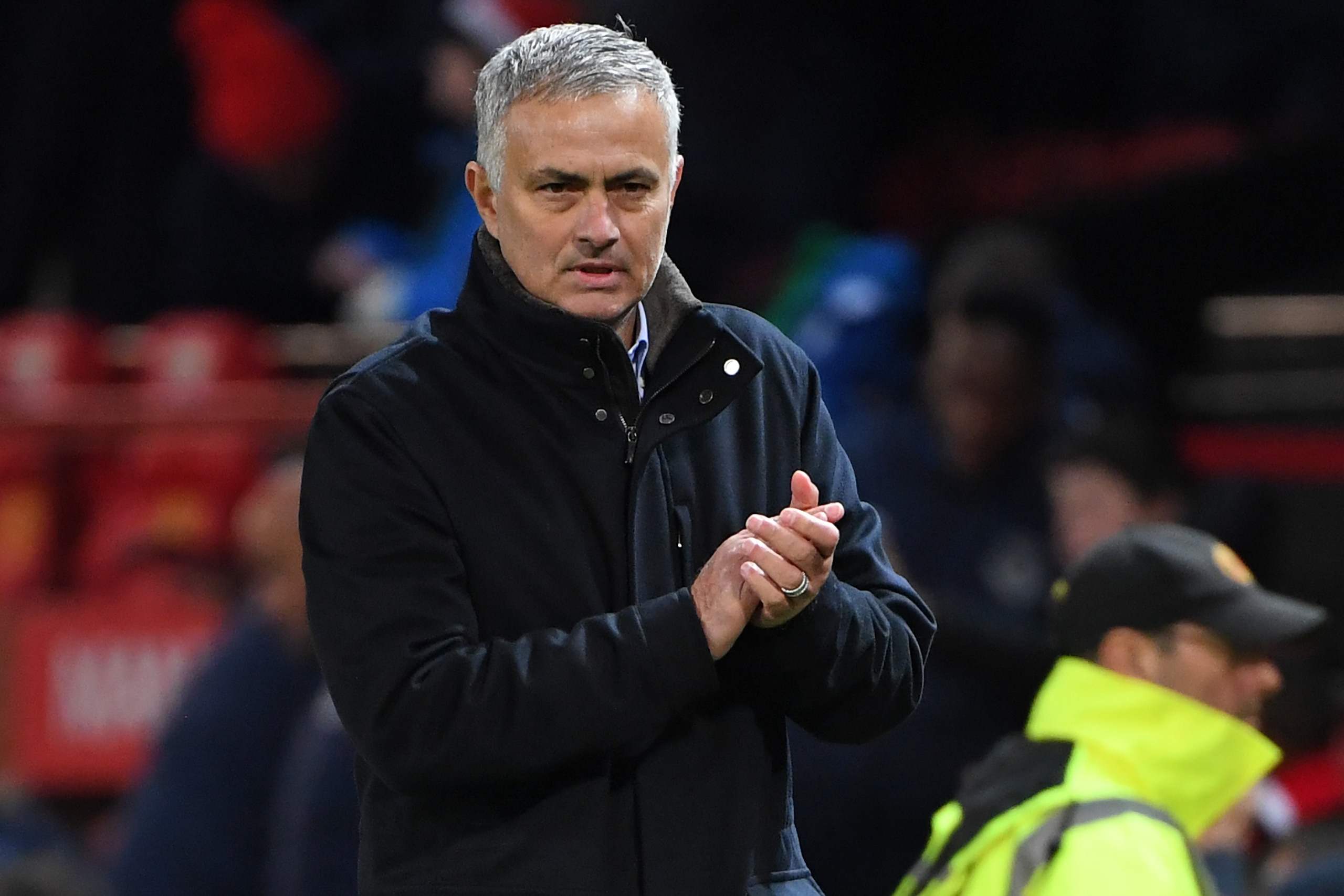 Manchester United's Portuguese manager Jose Mourinho leaves at full time in the English Premier League football match between Manchester United and Everton at Old Trafford in Manchester, north west England, on October 28, 2018. - Manchester Utd won the ga