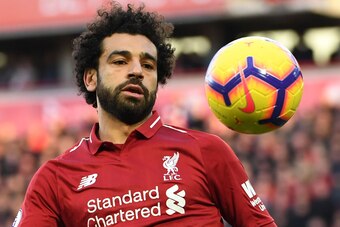 Liverpool's Egyptian midfielder Mohamed Salah eyes the ball during the English Premier League football match between Liverpool and Cardiff City at Anfield in Liverpool, north west England on October 27, 2018. (Photo by Paul ELLIS / AFP) / RESTRICTED TO ED