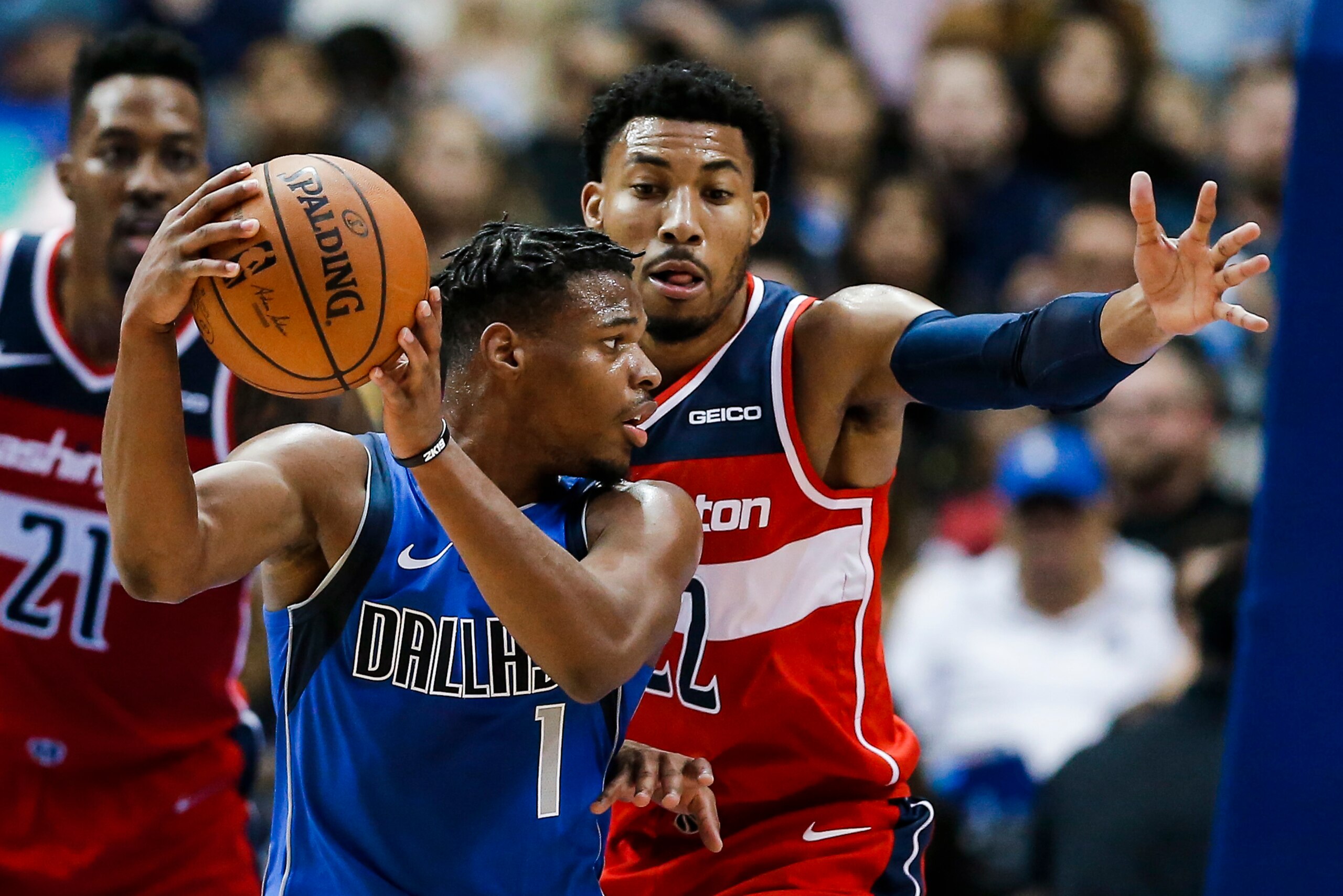 Dennis Smith Jr. (with ball) and Otto Porter Jr.