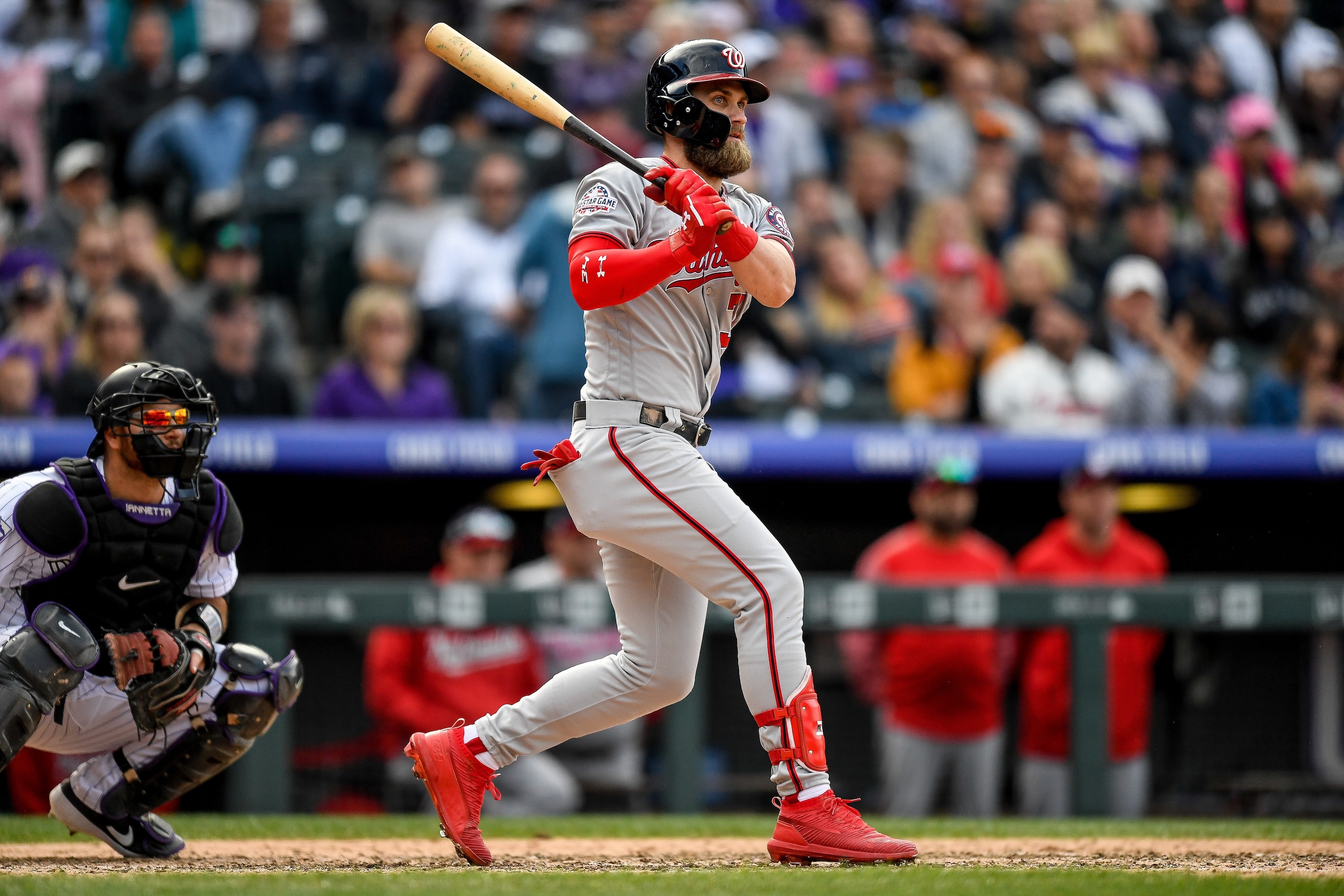 DENVER, CO - SEPTEMBER 30:  Bryce Harper #34 of the Washington Nationals hits a ninth inning double against the Colorado Rockies at Coors Field on September 30, 2018 in Denver, Colorado.  (Photo by Dustin Bradford/Getty Images)