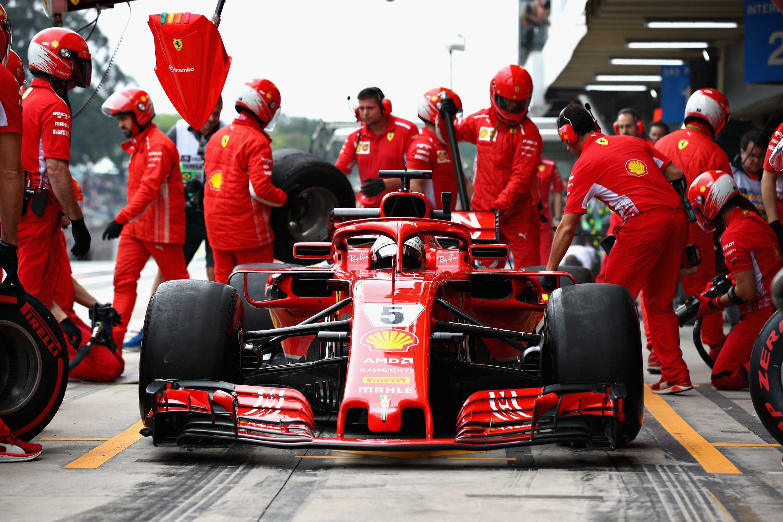 SAO PAULO, BRAZIL - NOVEMBER 09:  Sebastian Vettel of Germany and Ferrari stops for new tyres during practice for the Formula One Grand Prix of Brazil at Autodromo Jose Carlos Pace on November 9, 2018 in Sao Paulo, Brazil.  (Photo by Mark Thompson/Getty I