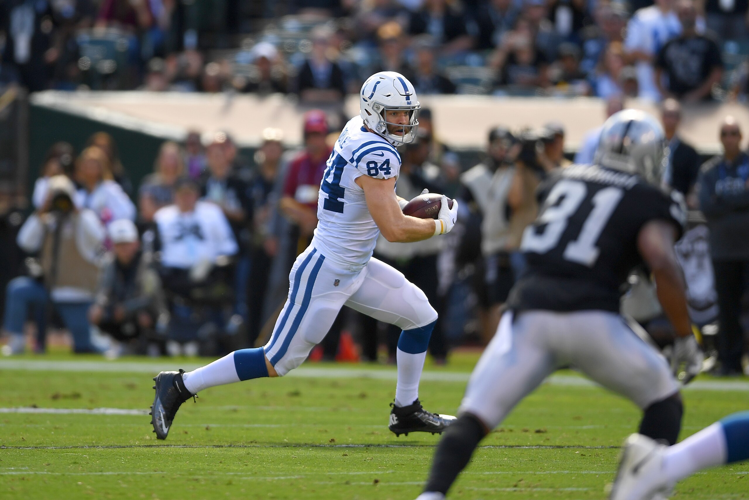 OAKLAND, CA - OCTOBER 28:  Jack Doyle #84 of the Indianapolis Colts runs with the ball after catching a pass against the Oakland Raiders during the first quarter of their NFL football game at Oakland-Alameda County Coliseum on October 28, 2018 in Oakland,