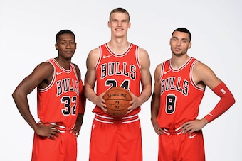 CHICAGO, IL - SEPTEMBER 25: Kris Dunn #32, Lauri Markkanen #24 and Zach LaVine #8 of the Chicago Bulls poses for a portrait during the 2017-18 NBA Media Day on September 25, 2017 at the United Center in Chicago, Illinois. NOTE TO USER: User expressly ackn