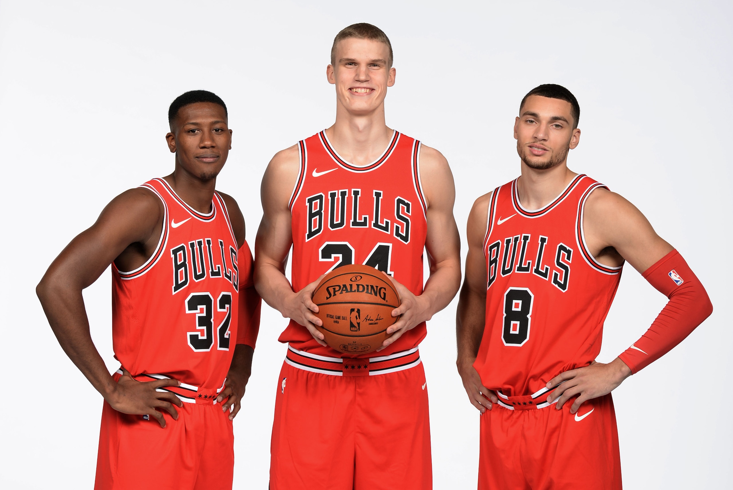 CHICAGO, IL - SEPTEMBER 25: Kris Dunn #32, Lauri Markkanen #24 and Zach LaVine #8 of the Chicago Bulls poses for a portrait during the 2017-18 NBA Media Day on September 25, 2017 at the United Center in Chicago, Illinois. NOTE TO USER: User expressly ackn