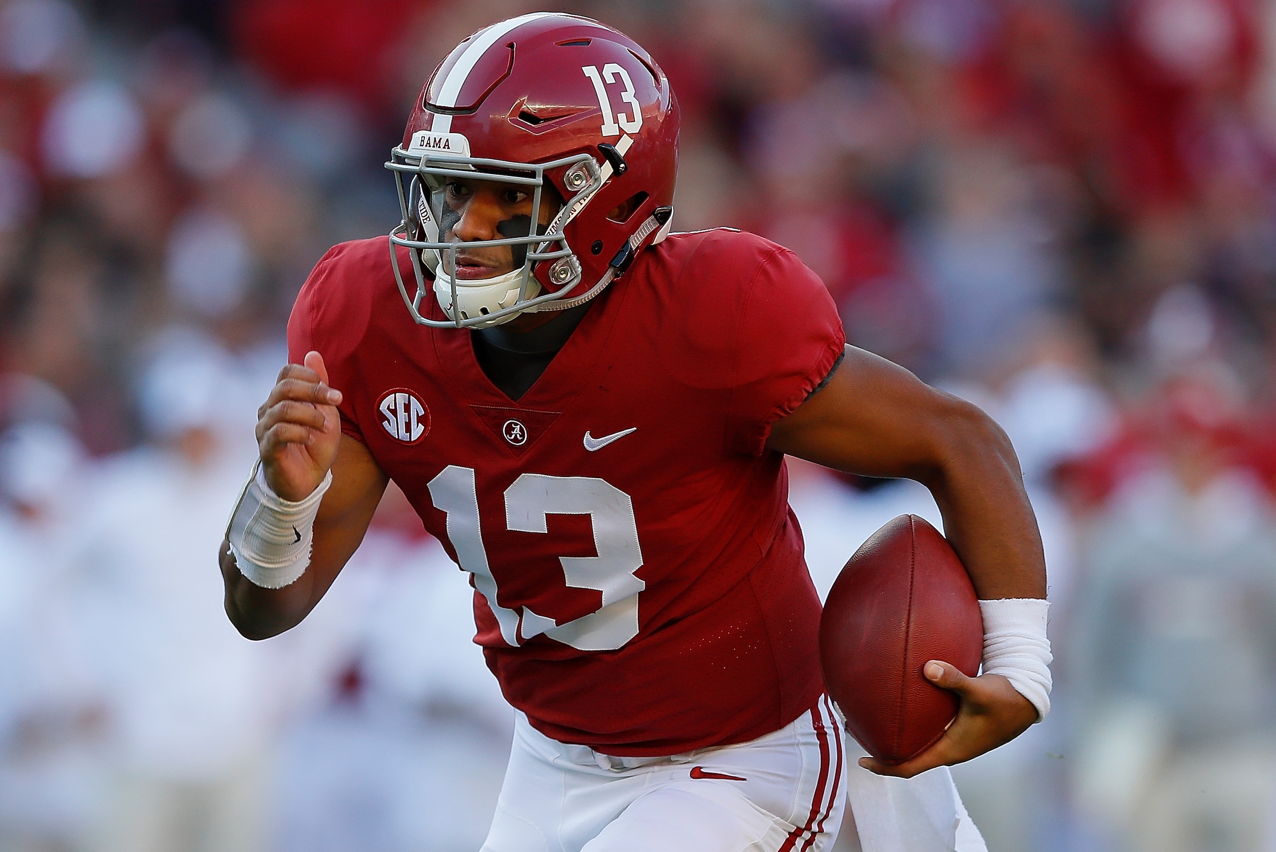 TUSCALOOSA, AL - NOVEMBER 10: Tua Tagovailoa #13 of the Alabama Crimson Tide rushes against the Mississippi State Bulldogs at Bryant-Denny Stadium on November 10, 2018 in Tuscaloosa, Alabama. (Photo by Kevin C. Cox/Getty Images) TUSCALOOSA, AL - NOVEMBER 10: Tua Tagovailoa #13 of the Alabama Crimson Tide rushes against the Mississippi State Bulldogs at Bryant-Denny Stadium on November 10, 2018 in Tuscaloosa, Alabama. (Photo by Kevin C. Cox/Getty Images)