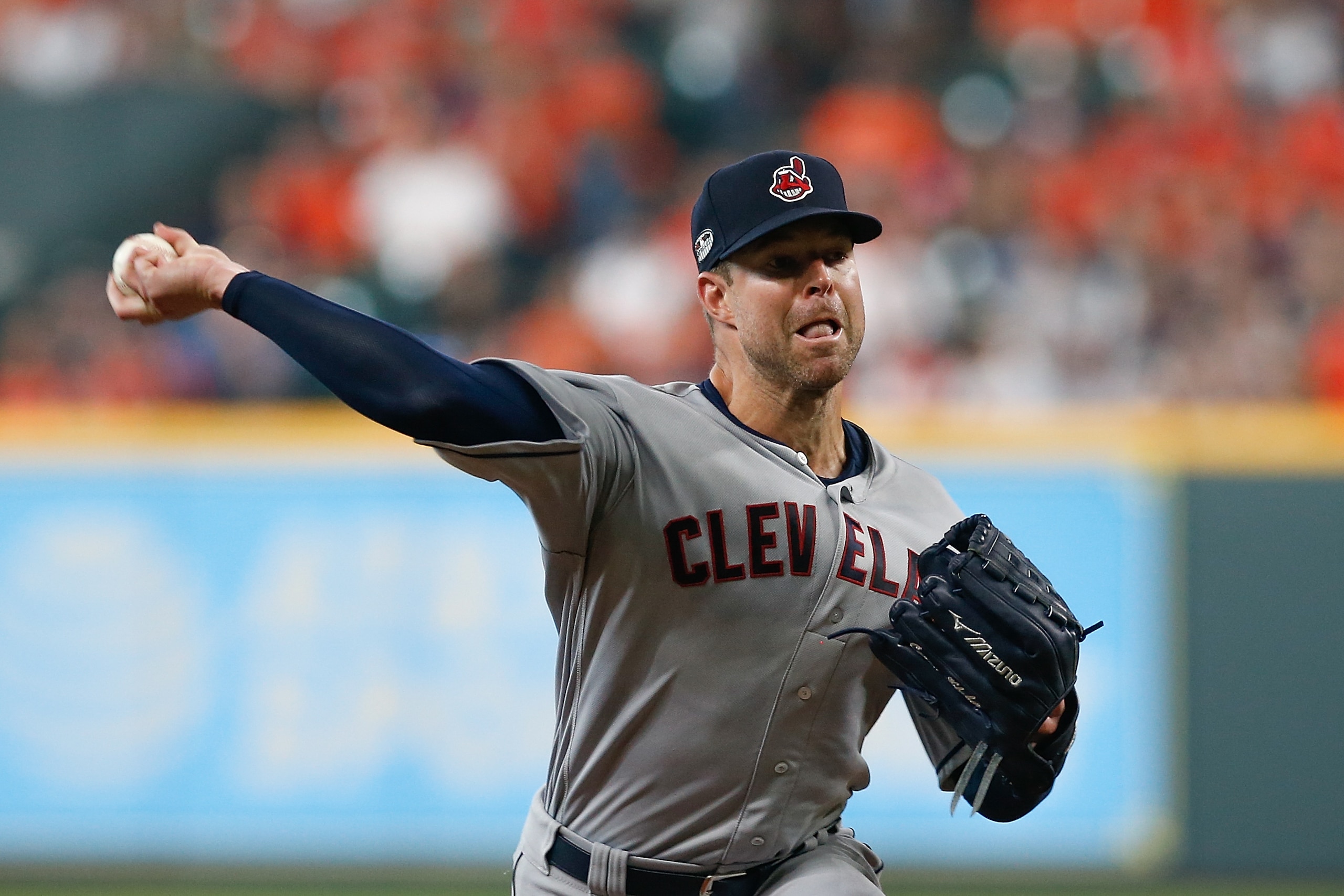 HOUSTON, TX - OCTOBER 05:  Corey Kluber #28 of the Cleveland Indians delivers a pitch in the first inning against the Houston Astros during Game One of the American League Division Series at Minute Maid Park on October 5, 2018 in Houston, Texas.  (Photo b