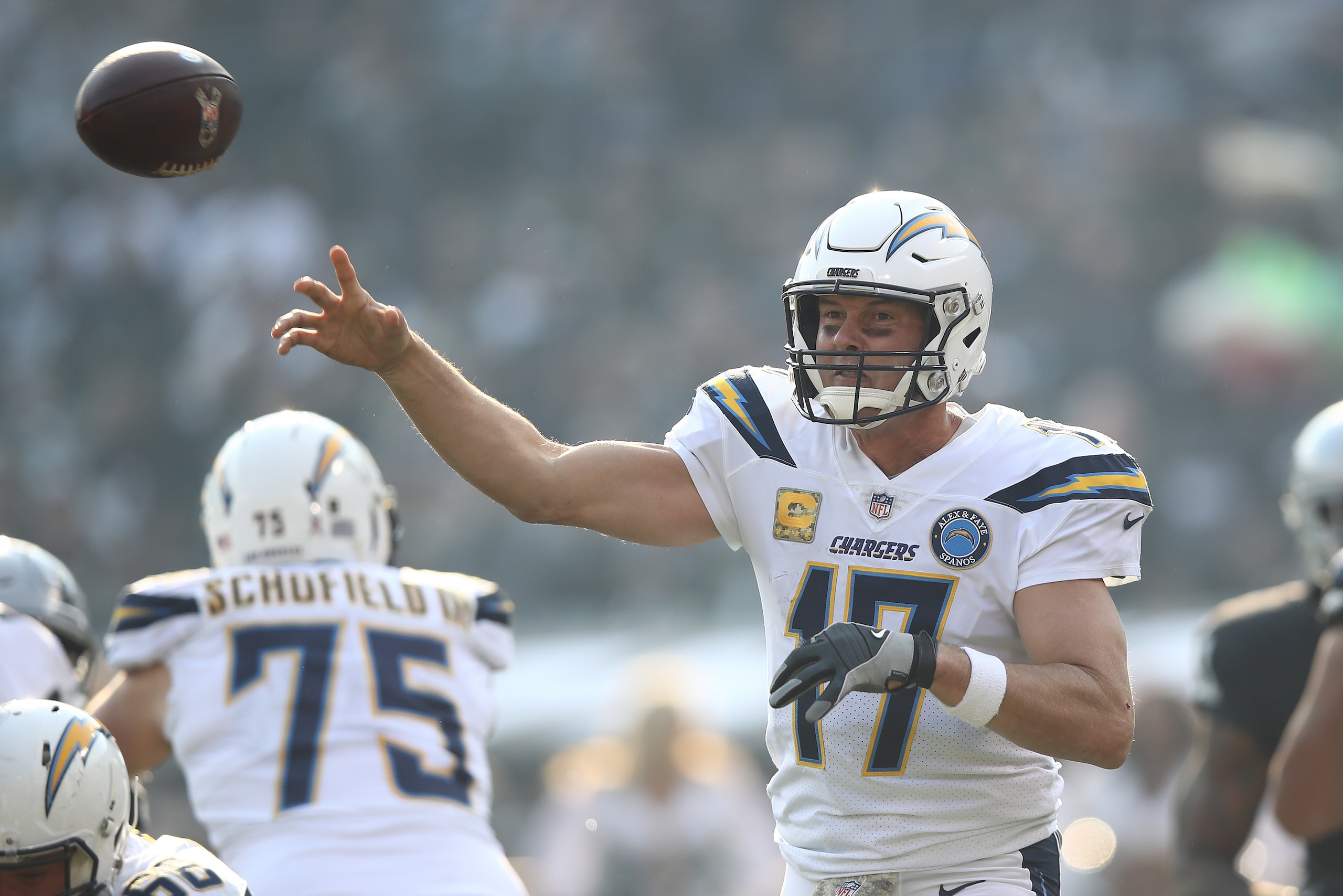 OAKLAND, CA - NOVEMBER 11: Philip Rivers #17 of the Los Angeles Chargers attempts a pass against the Oakland Raiders during their NFL game at Oakland-Alameda County Coliseum on November 11, 2018 in Oakland, California. (Photo by Ezra Shaw/Getty Images)