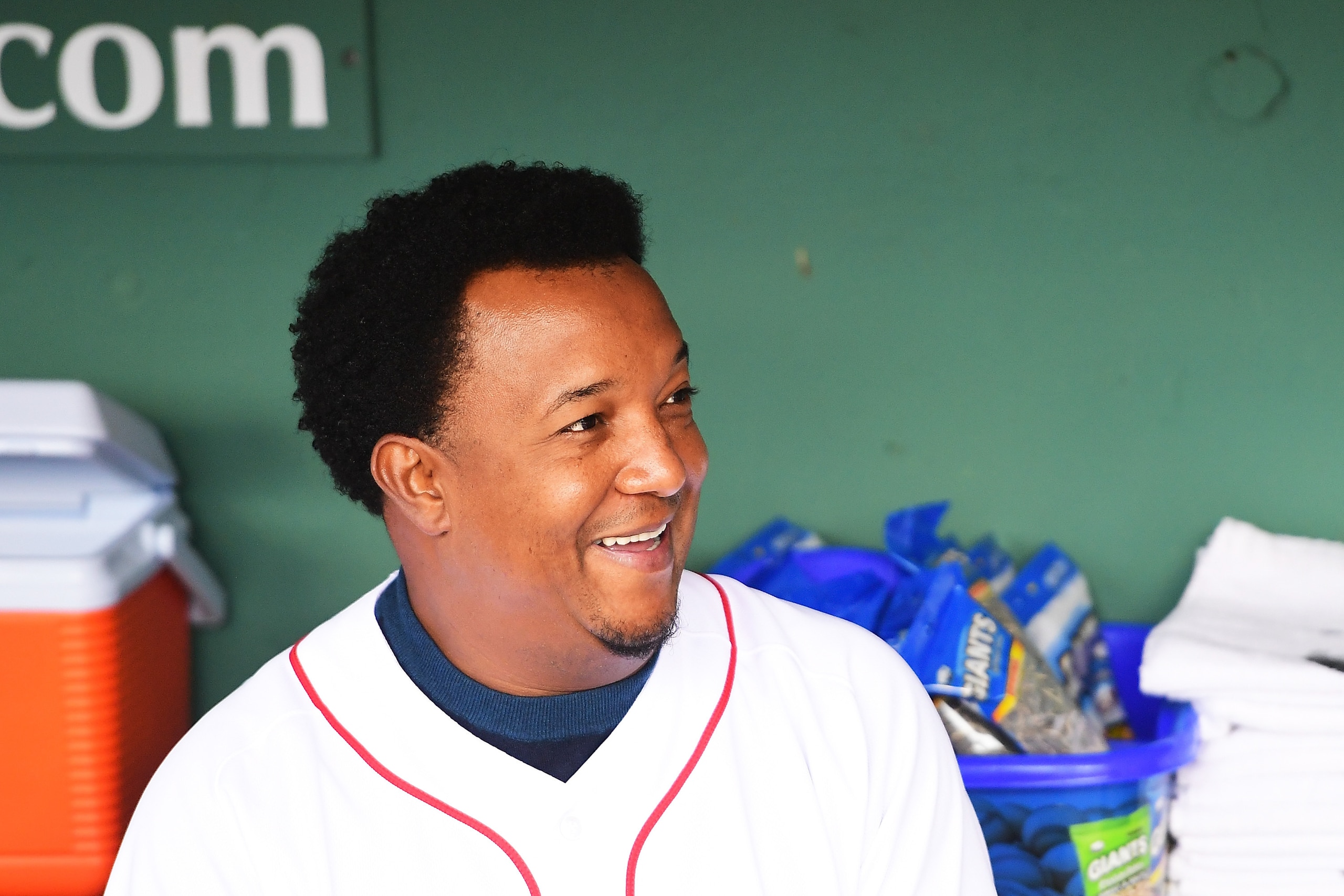 BOSTON, MA - MAY 27: Former Boston Red Sox player Pedro Martinez looks on from the dugout before a game against the Atlanta Braves at Fenway Park on May 27, 2018 in Boston, Massachusetts. (Photo by Adam Glanzman/Getty Images) BOSTON, MA - MAY 27: Former Boston Red Sox player Pedro Martinez looks on from the dugout before a game against the Atlanta Braves at Fenway Park on May 27, 2018 in Boston, Massachusetts. (Photo by Adam Glanzman/Getty Images)