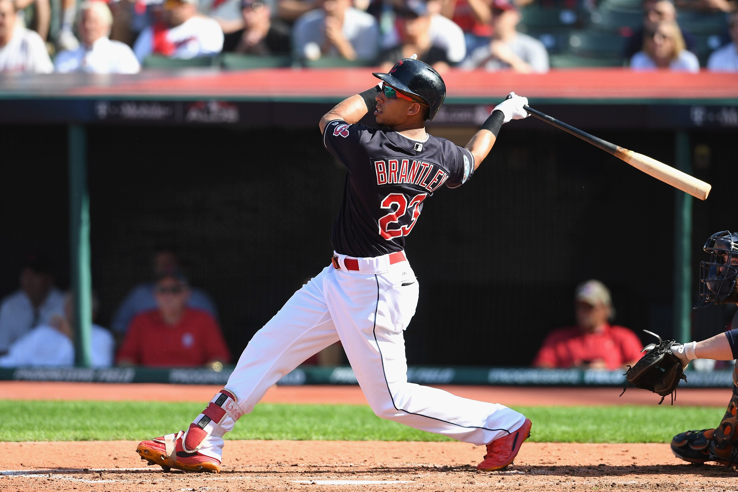 CLEVELAND, OH - OCTOBER 08: Michael Brantley #23 of the Cleveland Indians hits a sacrifice fly ball in the third inning to score Yan Gomes #7 (not pictured) against the Houston Astros during Game Three of the American League Division Series at Progressiv CLEVELAND, OH - OCTOBER 08: Michael Brantley #23 of the Cleveland Indians hits a sacrifice fly ball in the third inning to score Yan Gomes #7 (not pictured) against the Houston Astros during Game Three of the American League Division Series at Progressiv