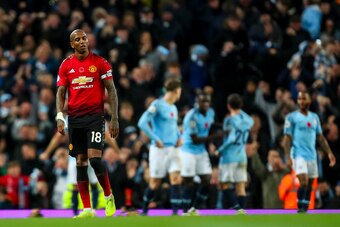 MANCHESTER, ENGLAND - NOVEMBER 11: A dejected Ashley Young of Manchester United reacts after conceding a goal to make it 3-1 during the Premier League match between Manchester City and Manchester United at Etihad Stadium on November 11, 2018 in Manchester
