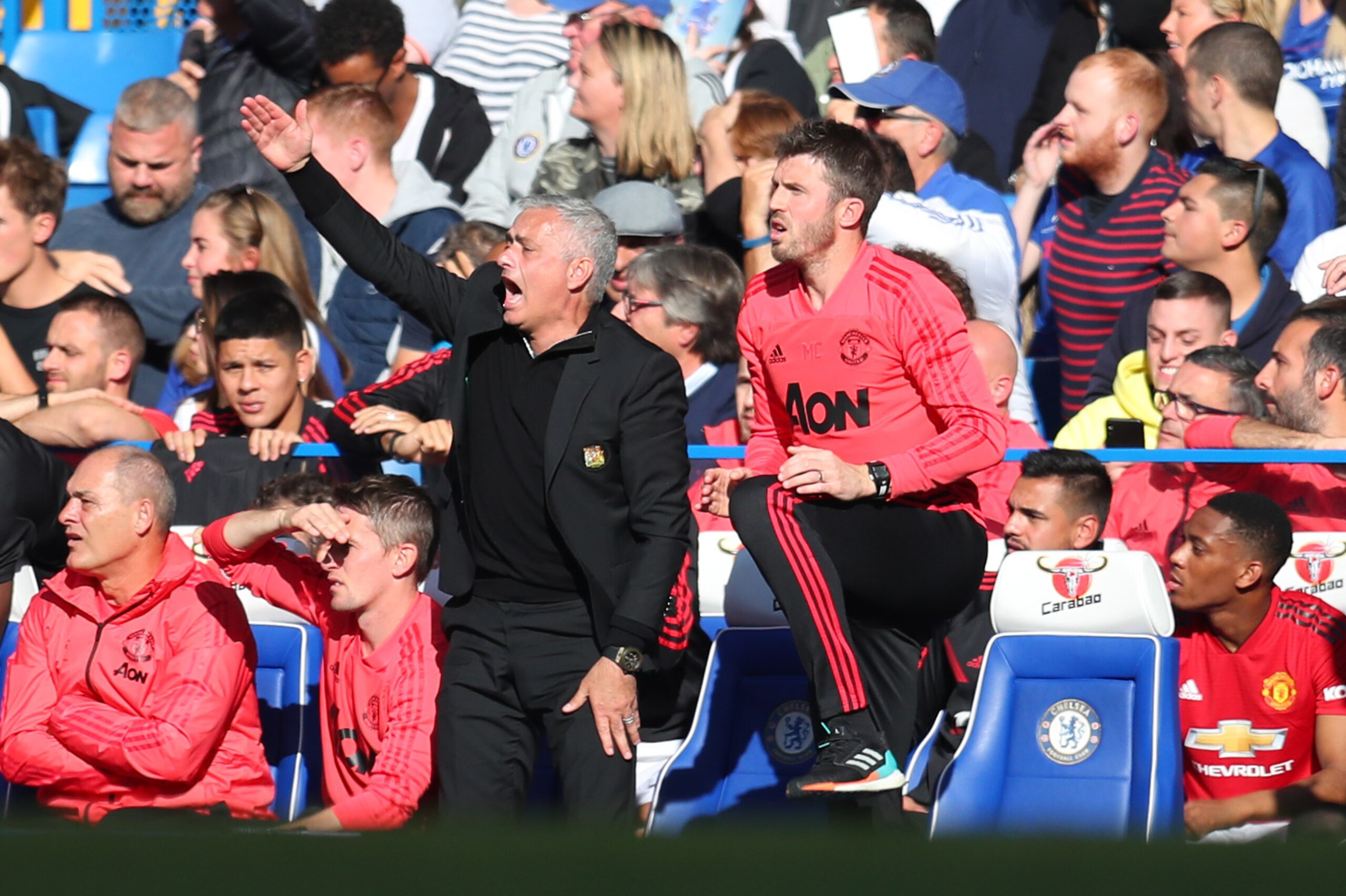 LONDON, ENGLAND - OCTOBER 20: Jose Mourinho manager of Manchester United appeals as assistant coach Michael Carrick looks on during the Premier League match between Chelsea FC and Manchester United at Stamford Bridge on October 20, 2018 in London, United 