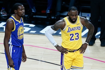 LAS VEGAS, NV- OCTOBER 10:   LeBron James #23 of the Los Angeles Lakers and Kevin Durant #35 of the Golden State Warriors look on during the game on October 10, 2018 at T-Mobile Arena in Las Vegas, Nevada. NOTE TO USER: User expressly acknowledges and agr