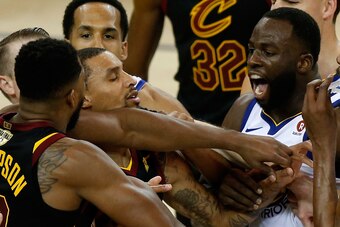OAKLAND, CA - MAY 31:  Tristan Thompson #13 of the Cleveland Cavaliers and Draymond Green #23 of the Golden State Warriors exchange words in overtime during Game 1 of the 2018 NBA Finals at ORACLE Arena on May 31, 2018 in Oakland, California. NOTE TO USER