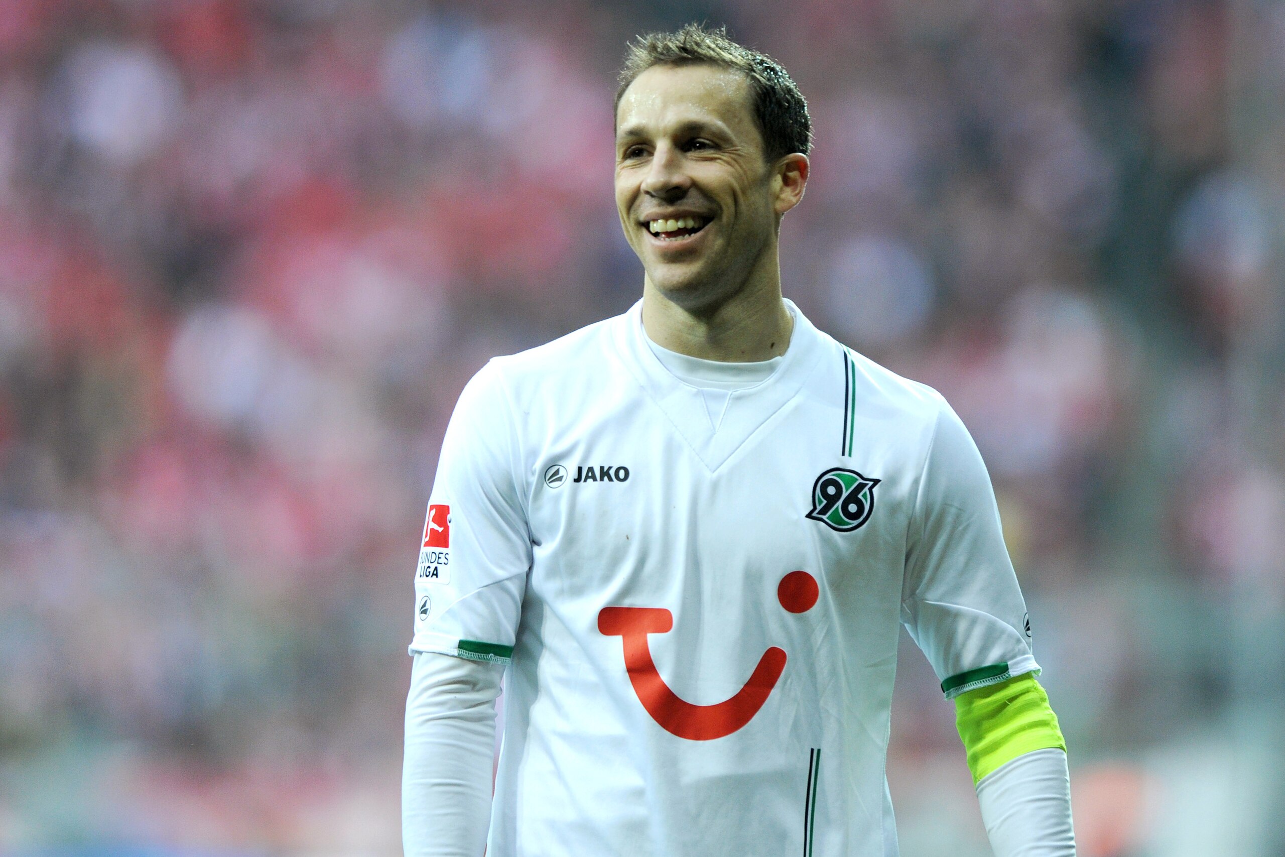 Hanover's US defender Steven Cherundolo laughs during the German first football division Bundesliga match between FC Bayern Munich and Hanover 96  in the stadium in Munich, Germany, on March 24, 2012. AFP PHOTO/CHRISTOF STACHE

RESTRICTIONS / EMBARGO - DF