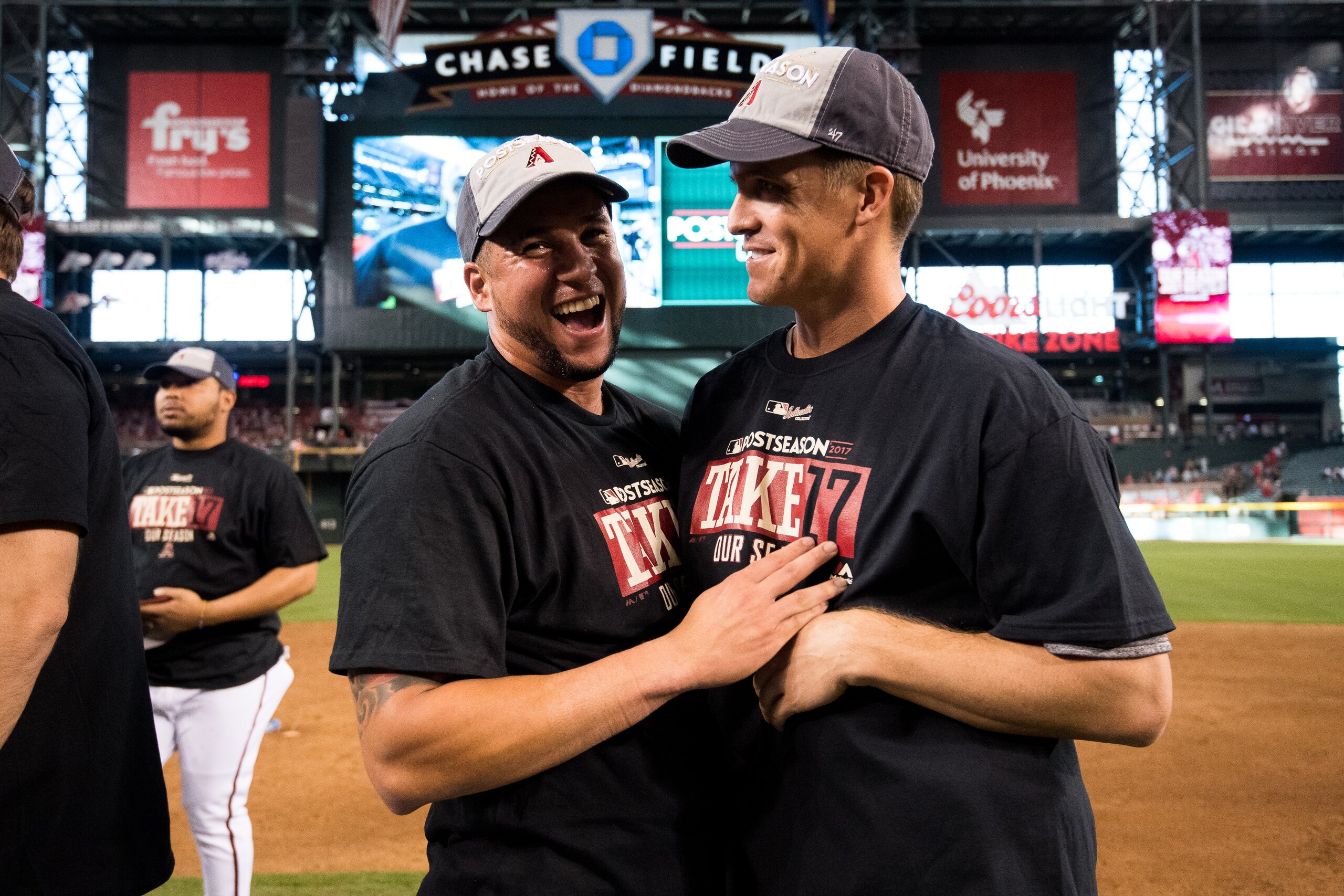 PHOENIX, AZ - SEPTEMBER 24: David Peralta #6 and Zack Greinke #21 of the Arizona Diamondbacks celebrate after defeating the Miami Marlins at Chase Field on September 24, 2017 in Phoenix, Arizona. The D-backs also clinched a Wild Card spot in the playoffs.