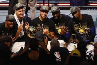CLEVELAND, OH - JUNE 08:  Andre Iguodala #9, Klay Thompson #11, Stephen Curry #30, Draymond Green #23 and Kevin Durant #35 of the Golden State Warriors celebrate after defeating the Cleveland Cavaliers during Game Four of the 2018 NBA Finals at Quicken Lo