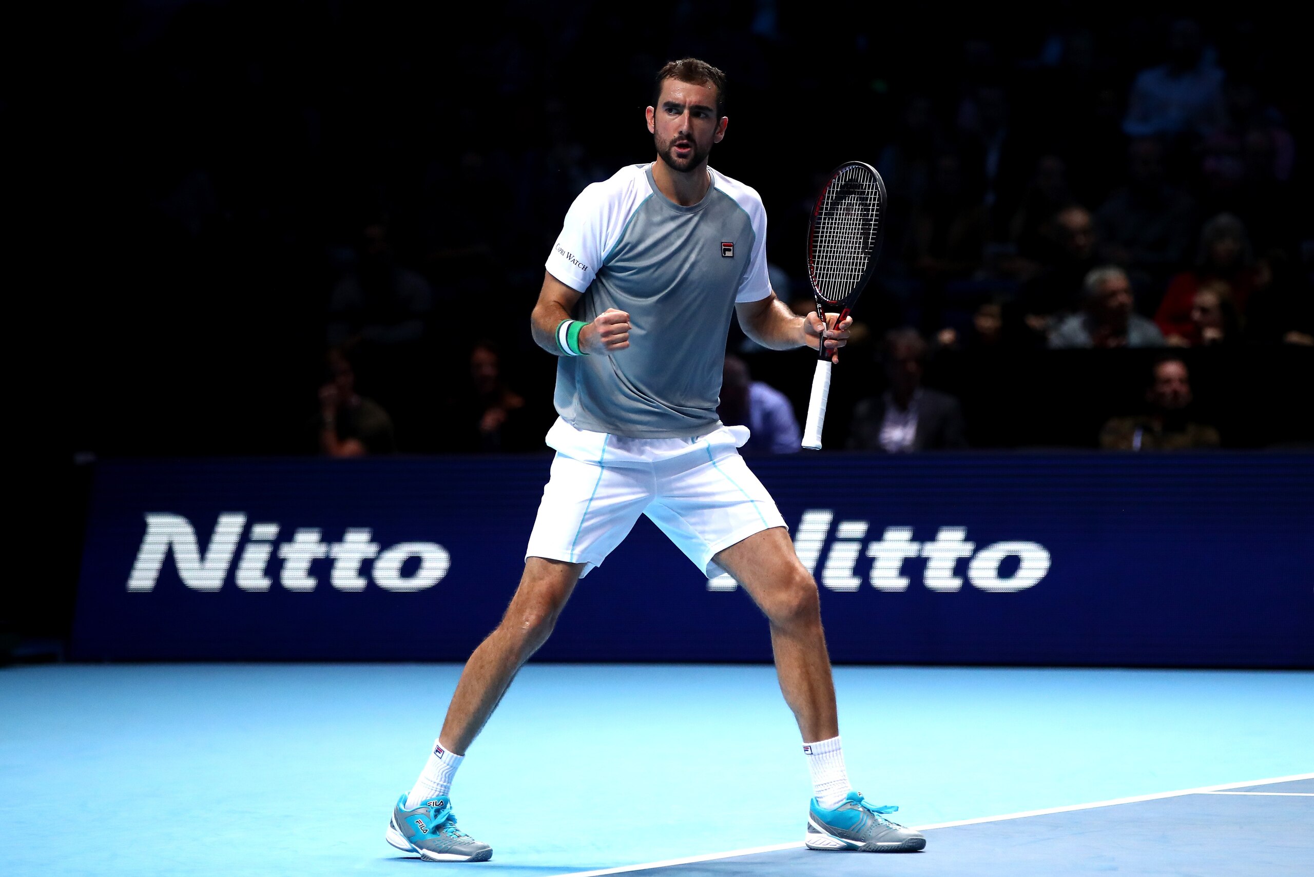 LONDON, ENGLAND - NOVEMBER 14:  Marin Cilic of Croatia celebrates during his singles round robin match against John Isner of The United States during Day Four of the Nitto ATP Finals at The O2 Arena on November 14, 2018 in London, England.  (Photo by Cliv