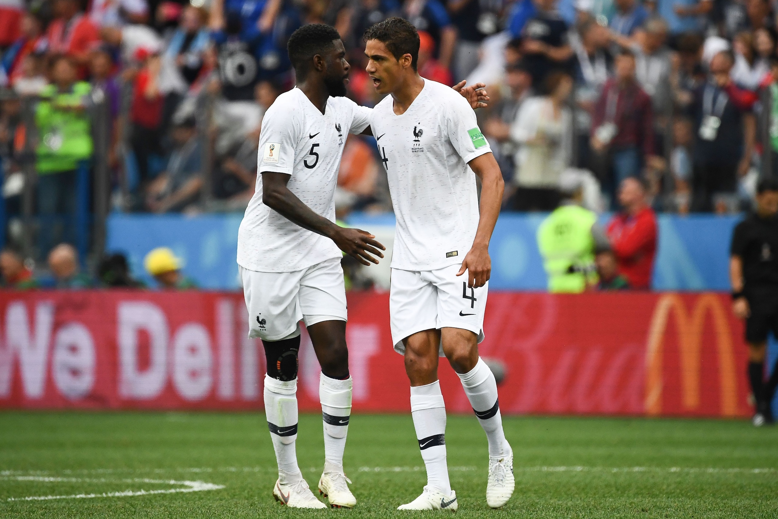 France's defender Raphael Varane (R) celebrates a goal with France's defender Samuel Umtiti during the Russia 2018 World Cup quarter-final football match between Uruguay and France at the Nizhny Novgorod Stadium in Nizhny Novgorod on July 6, 2018. (Photo 