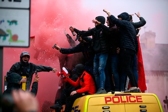 Cox was attacked amid supporter violence approaching Anfield back in April.
