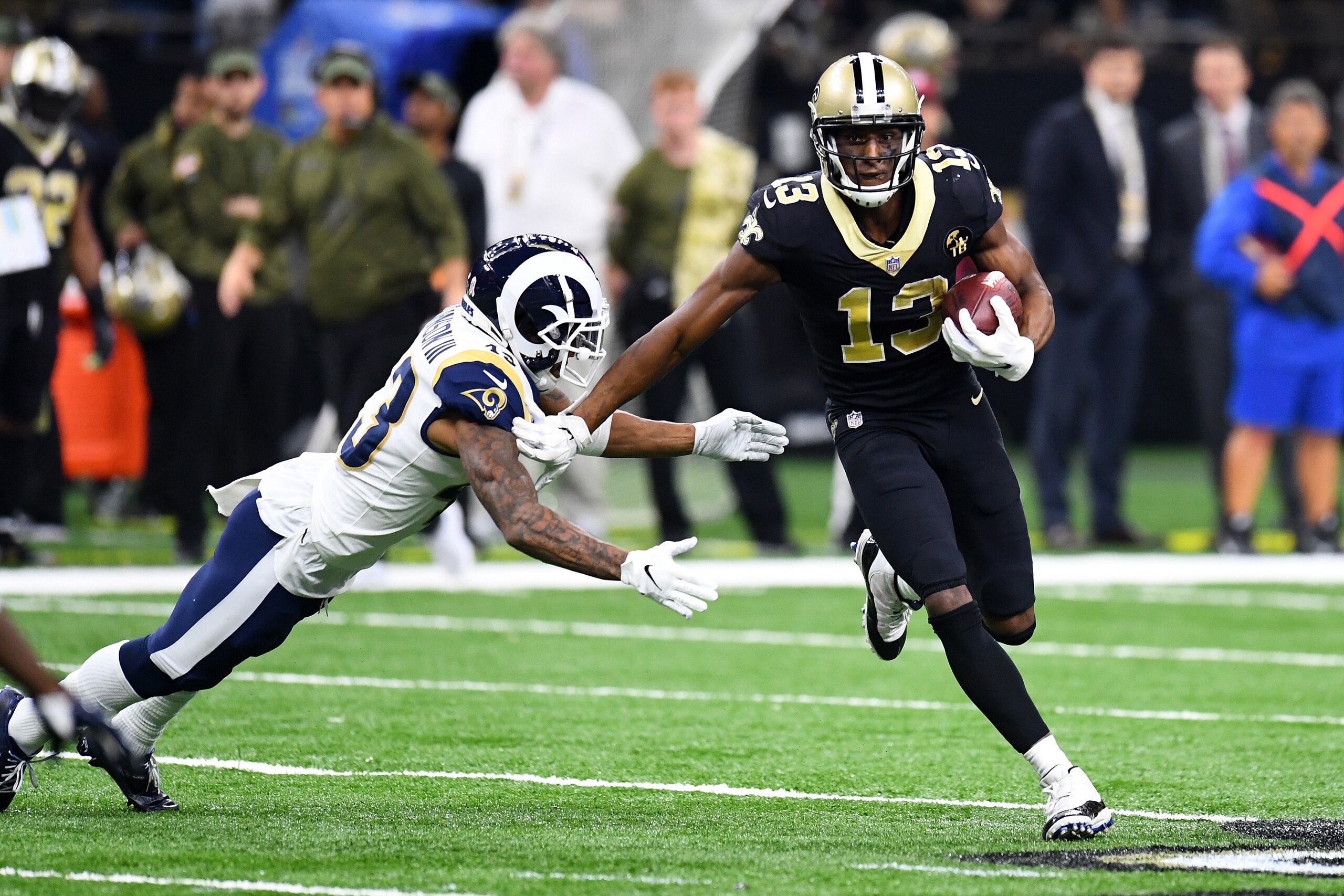 NEW ORLEANS, LA - NOVEMBER 4: Michael Thomas #13 of the New Orleans Saints runs after a catch against Sean Mannion #14 of the Los Angeles Rams at the Mercedes Benz Superdome on November 4, 2018 in New Orleans, Louisiana. (Photo by Scott Cunningham/Getty I NEW ORLEANS, LA - NOVEMBER 4: Michael Thomas #13 of the New Orleans Saints runs after a catch against Sean Mannion #14 of the Los Angeles Rams at the Mercedes Benz Superdome on November 4, 2018 in New Orleans, Louisiana. (Photo by Scott Cunningham/Getty I