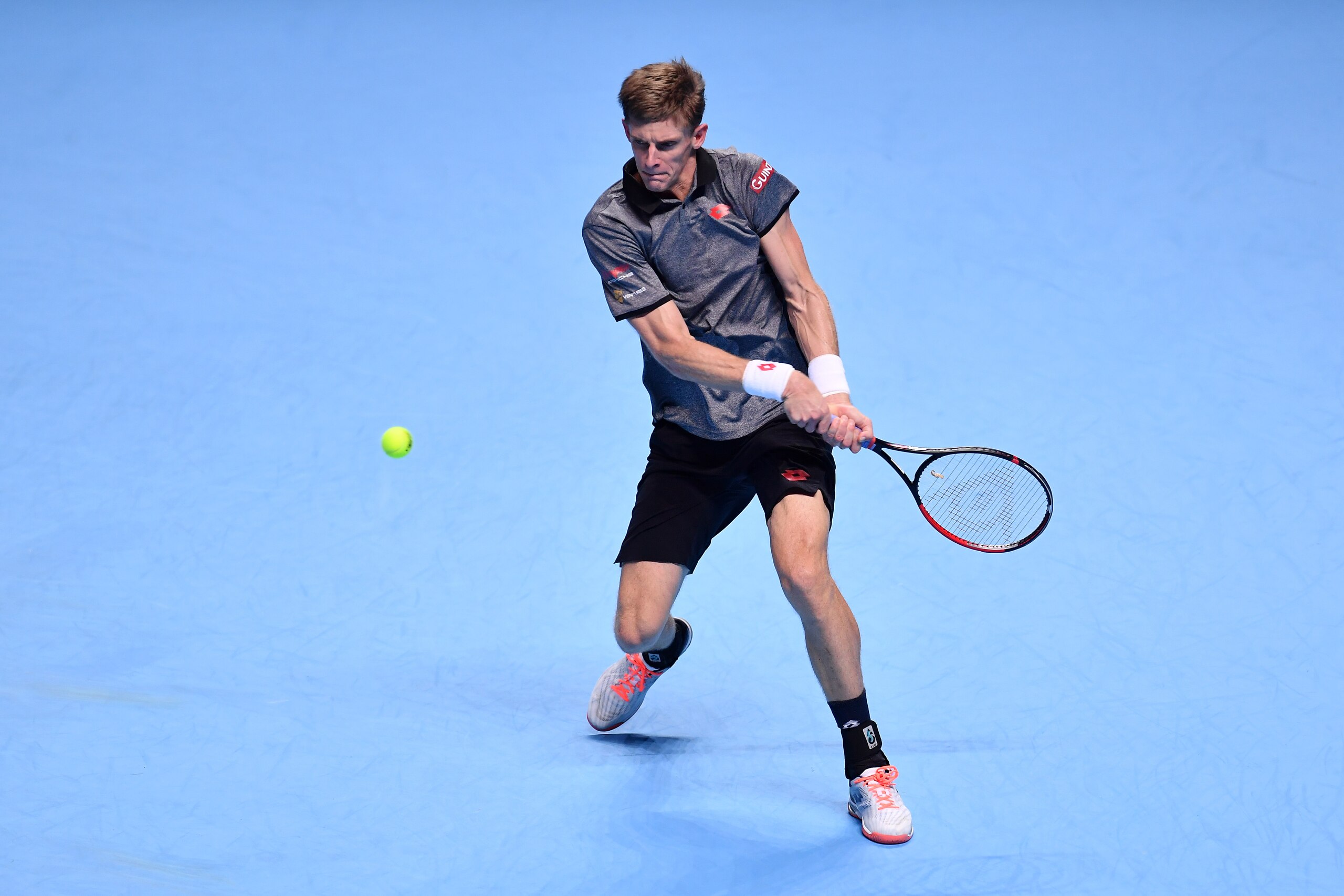 LONDON, ENGLAND - NOVEMBER 17:  Kevin Anderson of South Africa plays a backhand shot in his semi finals singles match against Novak Djokovic of Serbia during Day Seven of the Nitto ATP Finals at The O2 Arena on November 17, 2018 in London, England.  (Phot