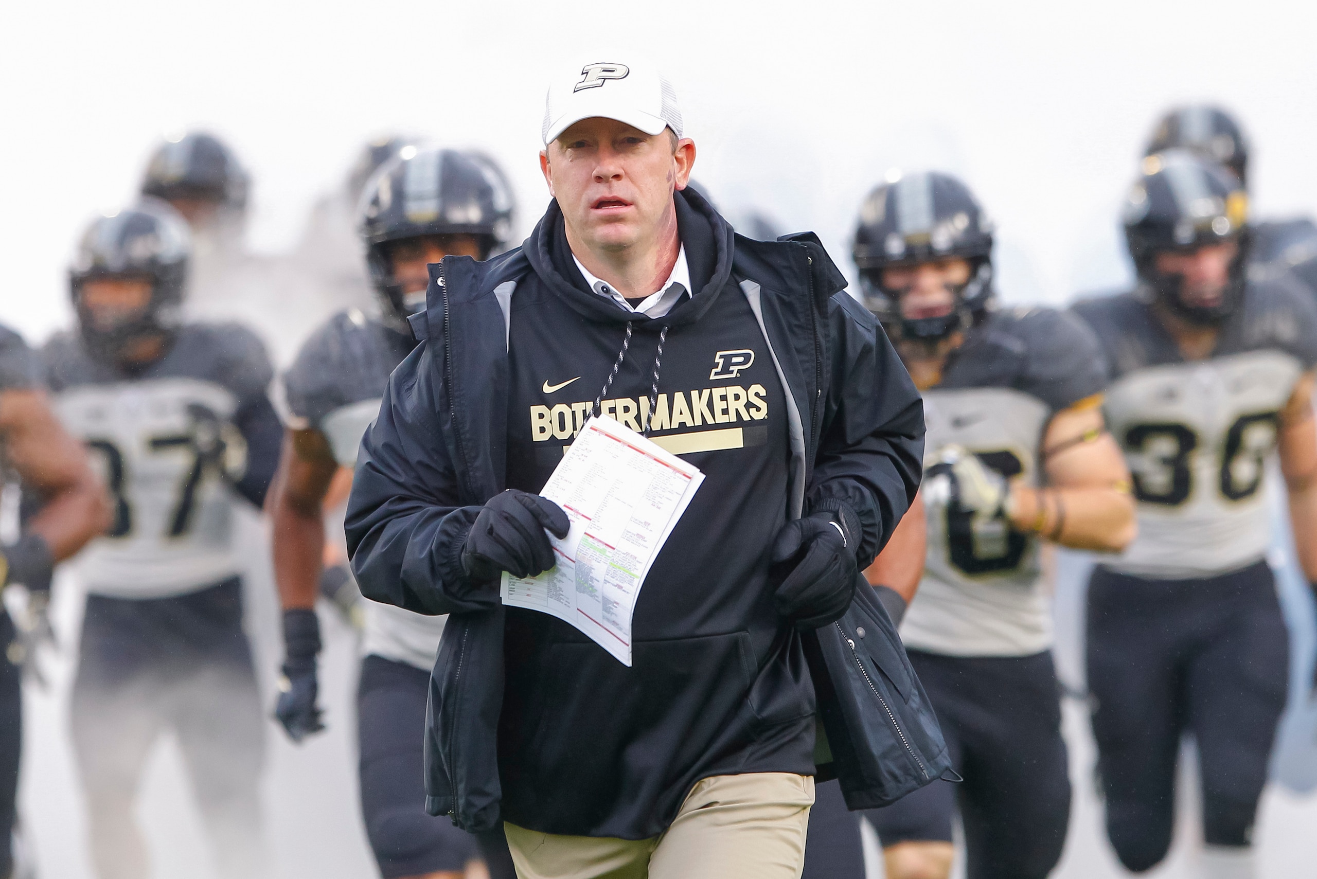 WEST LAFAYETTE, IN - NOVEMBER 04:  Head coach Jeff Brohm of the Purdue Boilermakers runs out with the team before the game against the Illinois Fighting Illini at Ross-Ade Stadium on November 4, 2017 in West Lafayette, Indiana. (Photo by Michael Hickey/Ge