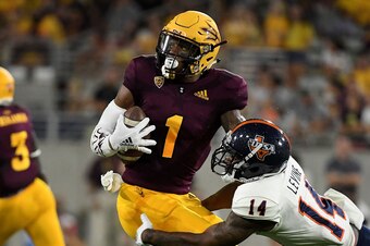TEMPE, AZ - SEPTEMBER 01:  Wide receiver N'Keal Harry #1 of the Arizona State Sun Devils breaks the tackle by safety C.J. Levine #14 of the UTSA Roadrunners to score a 58 yard touchdown in the first half at Sun Devil Stadium on September 1, 2018 in Tempe,