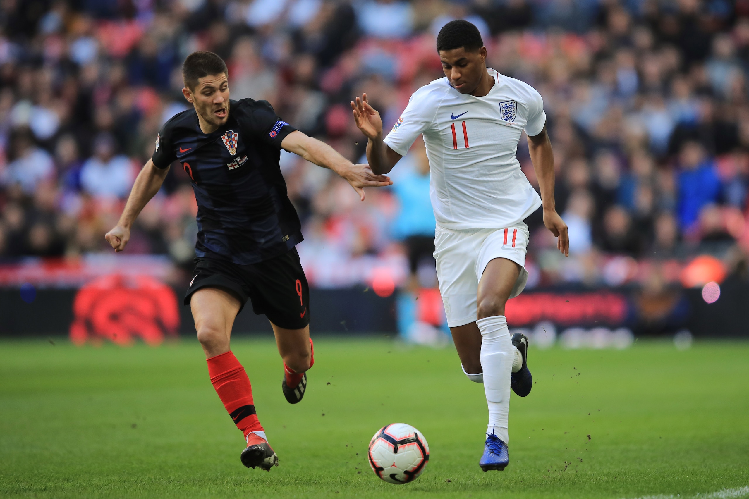 LONDON, ENGLAND - NOVEMBER 18: Marcus Rashford of England in action with Andrej Kramaric of Croatia during the UEFA Nations League A group four match between England and Croatia at Wembley Stadium on November 18, 2018 in London, United Kingdom. (Photo by 