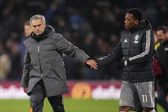 BURNLEY, ENGLAND - JANUARY 20: Jose Mourinho the head coach / manager of Manchester United and Anthony Martial of Manchester United celebrate at full time during the Premier League match between Burnley and Manchester United at Turf Moor on January 20, 20