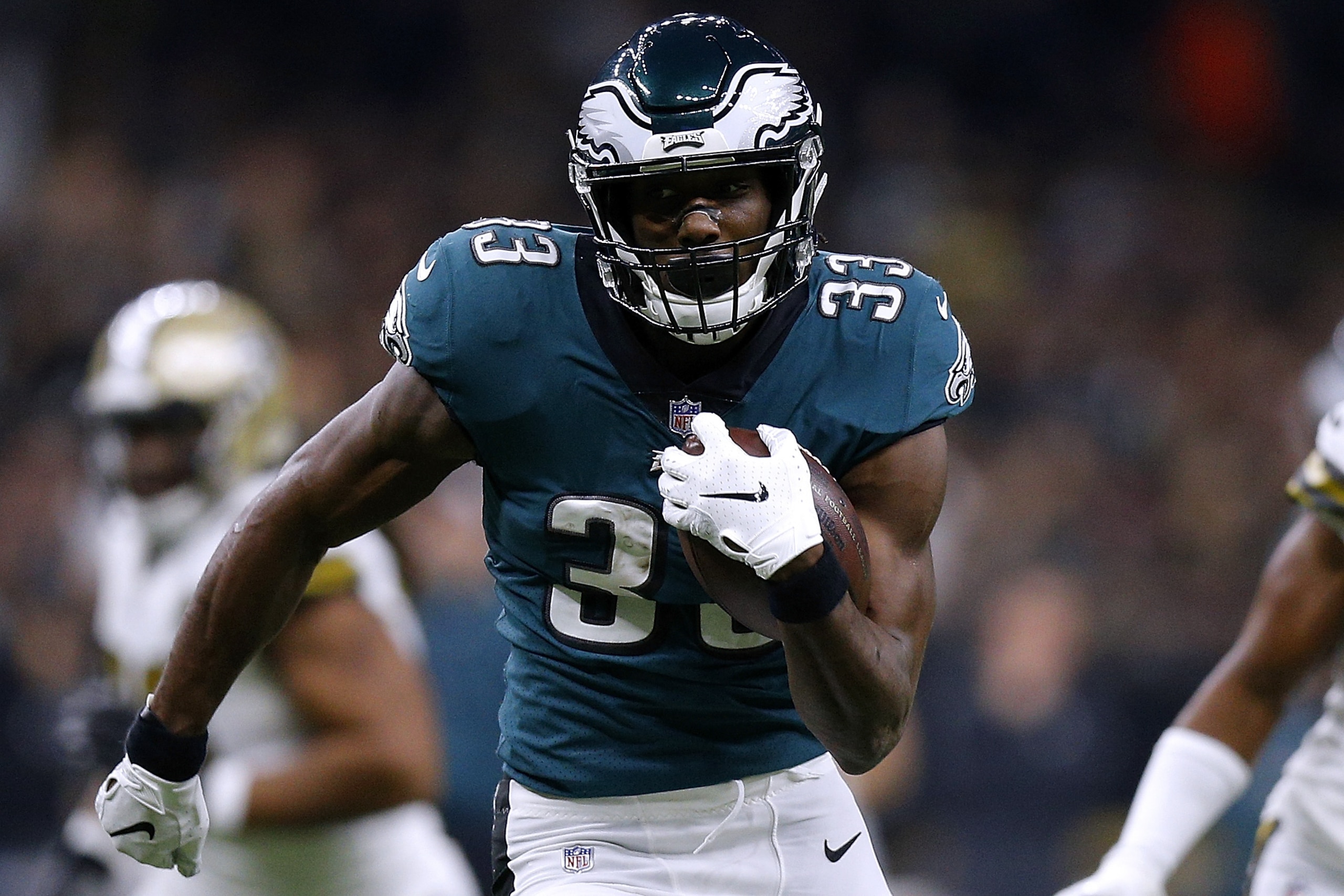 NEW ORLEANS, LOUISIANA - NOVEMBER 18: Josh Adams #33 of the Philadelphia Eagles runs with the ball for a touchdown  during the first half against the New Orleans Saints at the Mercedes-Benz Superdome on November 18, 2018 in New Orleans, Louisiana. (Photo 
