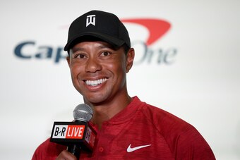 LAS VEGAS, NV - NOVEMBER 20:  Tiger Woods speaks with the media alongside Phil Mickelson (not seen) during a press conference before The Match at Shadow Creek Golf Course on November 20, 2018 in Las Vegas, Nevada.  (Photo by Harry How/Getty Images for The