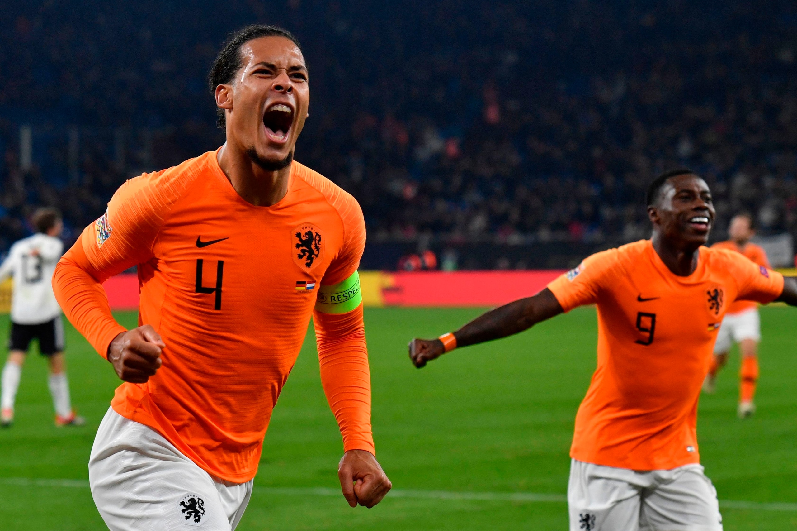 Netherlands' defender Virgil van Dijk celebrates after scoring during the UEFA Nations League football match Germany v the Netherlands in Gelsenkirchen on November 19, 2018. (Photo by John MACDOUGALL / AFP) (Photo credit should read JOHN MACDOUGALL Netherlands' defender Virgil van Dijk celebrates after scoring during the UEFA Nations League football match Germany v the Netherlands in Gelsenkirchen on November 19, 2018. (Photo by John MACDOUGALL / AFP) (Photo credit should read JOHN MACDOUGALL