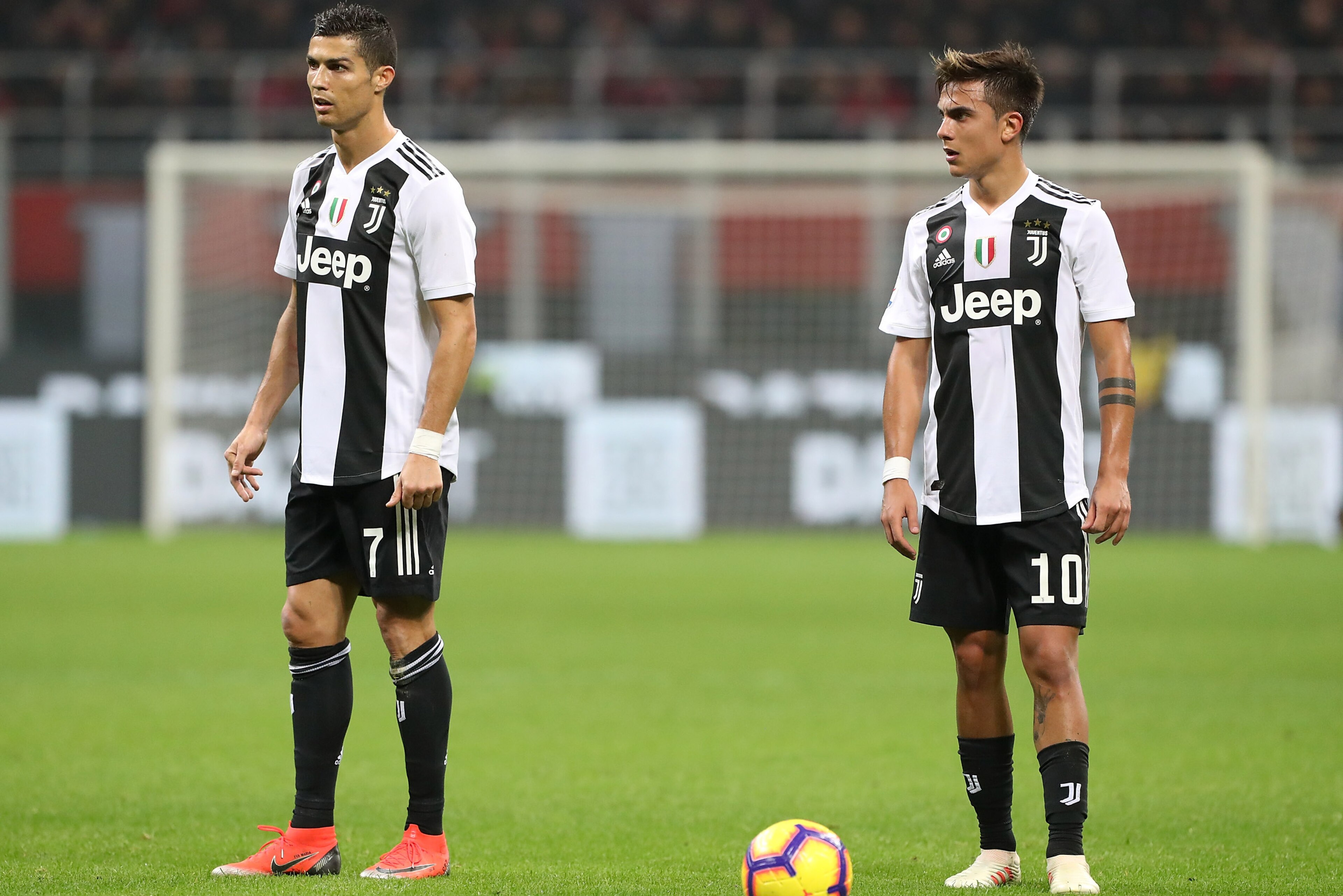 MILAN, ITALY - NOVEMBER 11:  Cristiano Ronaldo and Paulo Dybala of Juventus FC look on during the Serie A match between AC Milan and Juventus at Stadio Giuseppe Meazza on November 11, 2018 in Milan, Italy.  (Photo by Marco Luzzani/Getty Images)
