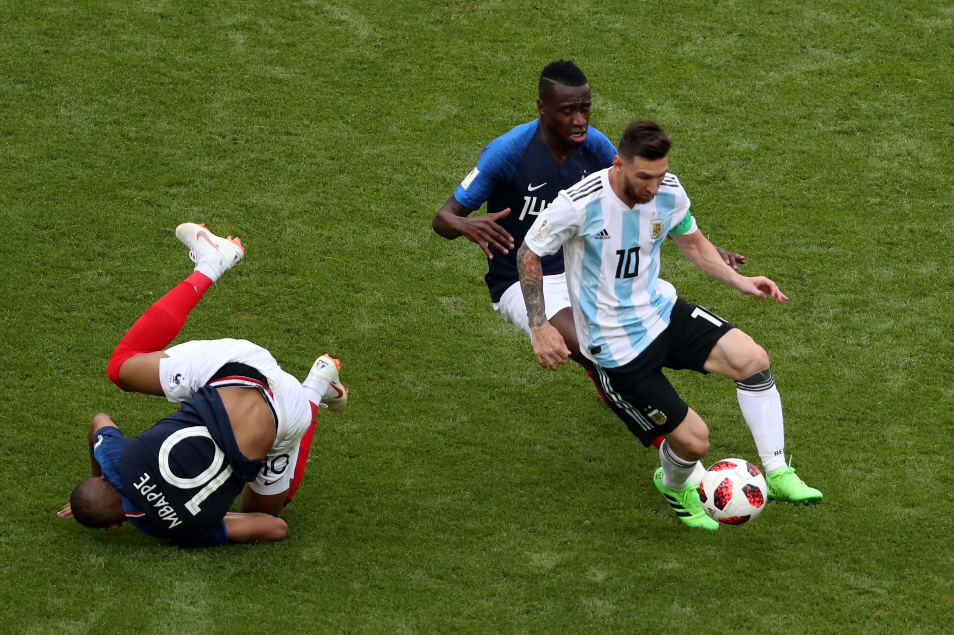 KAZAN, RUSSIA - JUNE 30: Lionel Messi of Argentina is challenged by Blaise Matuidi and Kylian Mbappe of France during the 2018 FIFA World Cup Russia Round of 16 match between France and Argentina at Kazan Arena on June 30, 2018 in Kazan, Russia. (Photo by