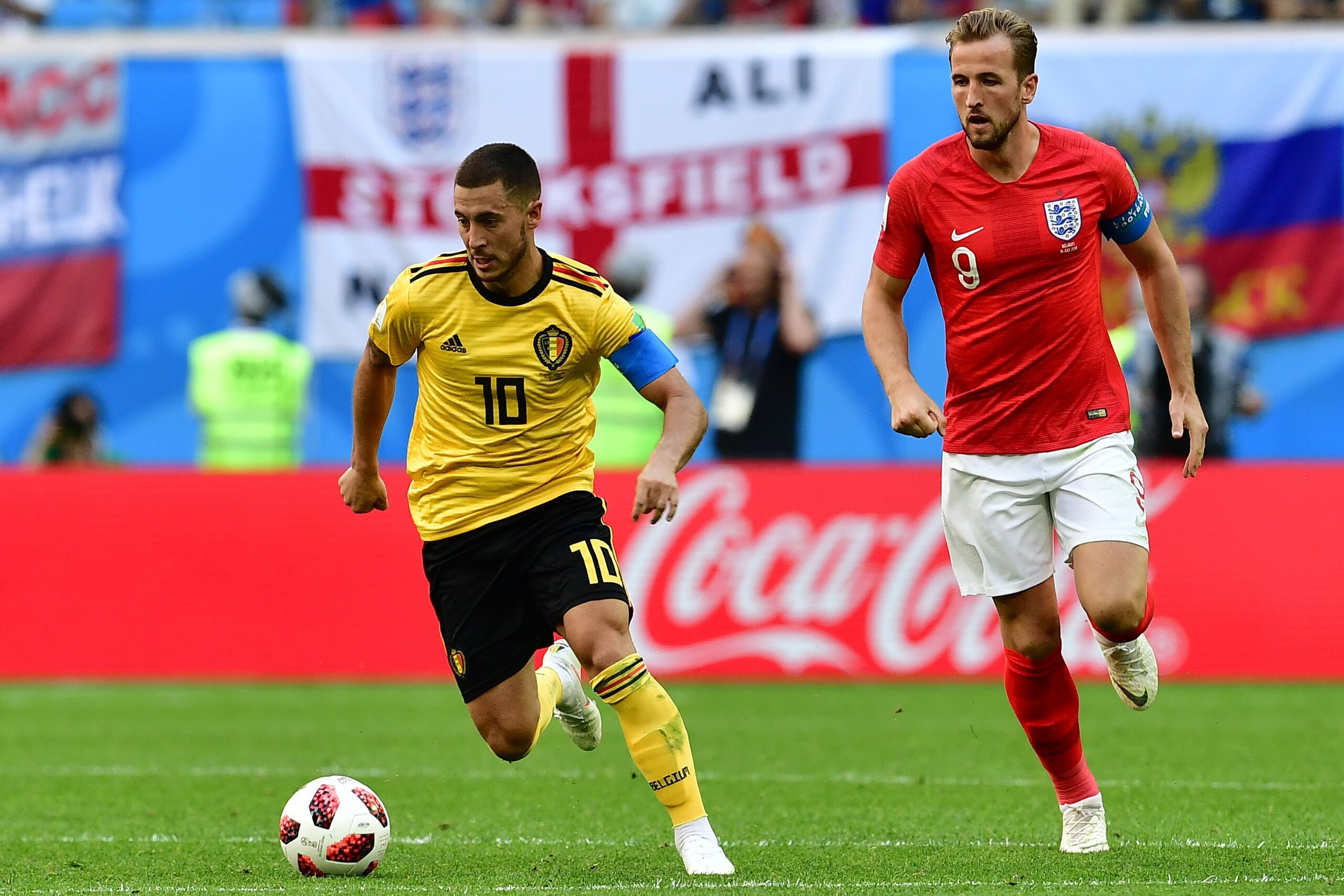 Belgium's forward Eden Hazard (L) vies with England's forward Harry Kane during their Russia 2018 World Cup play-off for third place football match between Belgium and England at the Saint Petersburg Stadium in Saint Petersburg on July 14, 2018. (Photo by