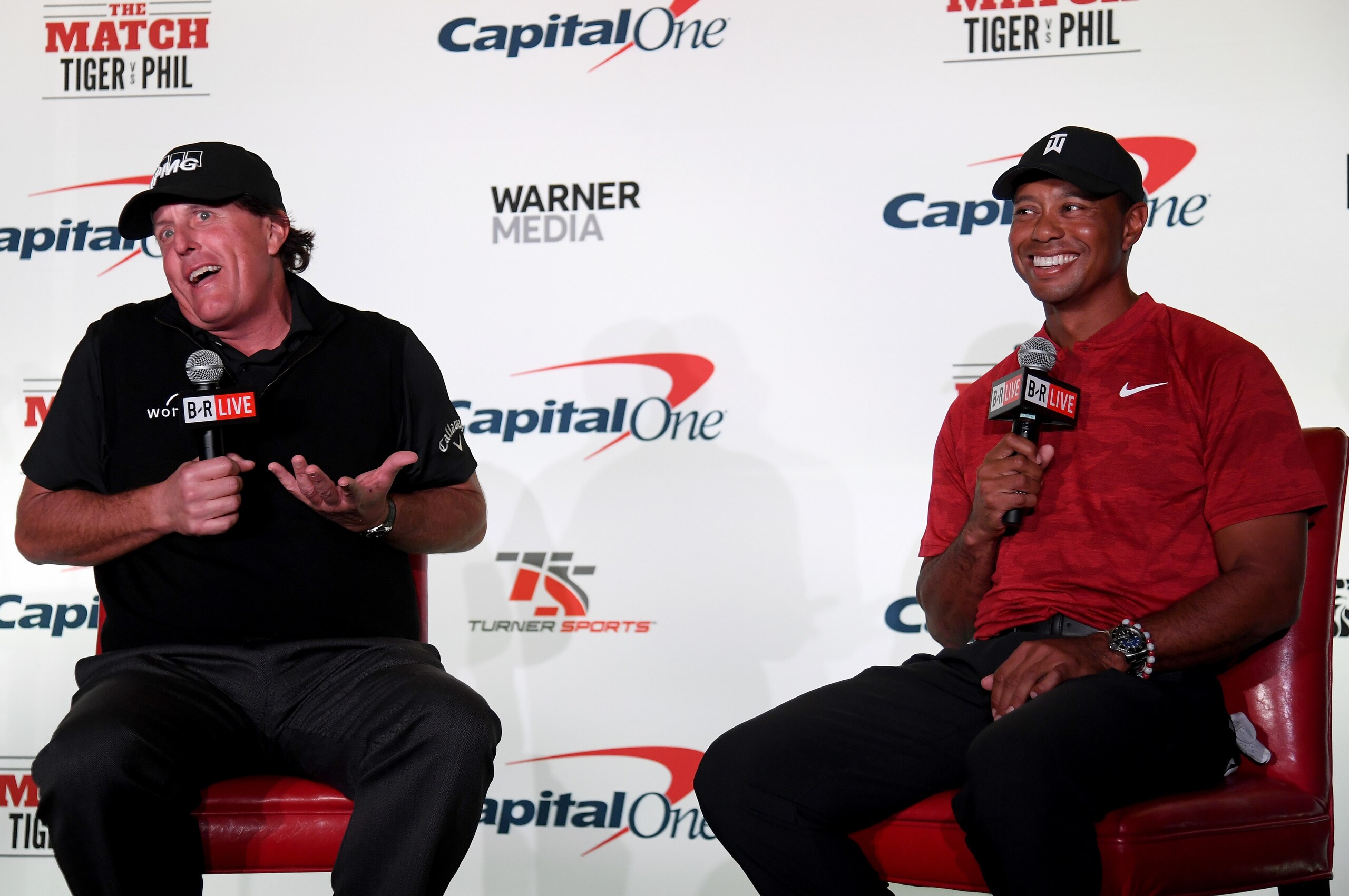 LAS VEGAS, NV - NOVEMBER 20:  (L-R) Phil Mickelson and Tiger Woods speak with the media during a press conference before The Match at Shadow Creek Golf Course on November 20, 2018 in Las Vegas, Nevada.  (Photo by Harry How/Getty Images for The Match)