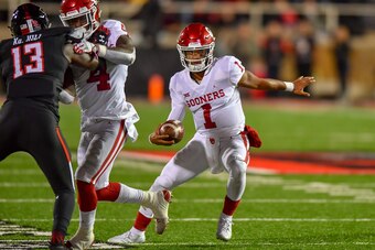 LUBBOCK, TX - NOVEMBER 03: Kyler Murray #1 of the Oklahoma Sooners looks for room to run during the game against the Texas Tech Red Raiders on November 3, 2018 at Jones AT&T Stadium in Lubbock, Texas. Oklahoma defeated Texas Tech 51-46. (Photo by John Wea
