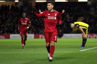 WATFORD, ENGLAND - NOVEMBER 24:  Roberto Firmino of Liverpool celebrates after scoring his team's third goal during the Premier League match between Watford FC and Liverpool FC at Vicarage Road on November 24, 2018 in Watford, United Kingdom.  (Photo by R