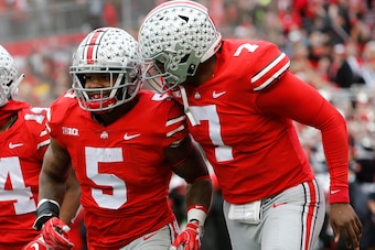 Ohio State's Dwayne Haskins (7) and Baron Browning (5)