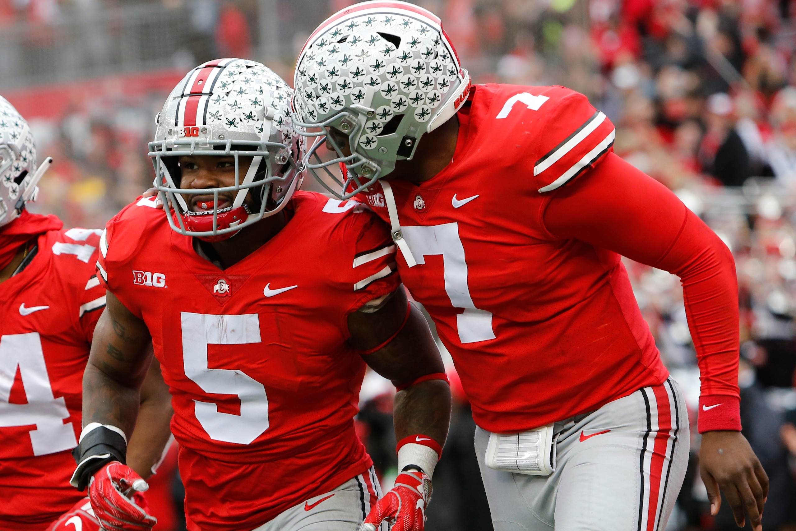 Ohio State's Dwayne Haskins (7) and Baron Browning (5)