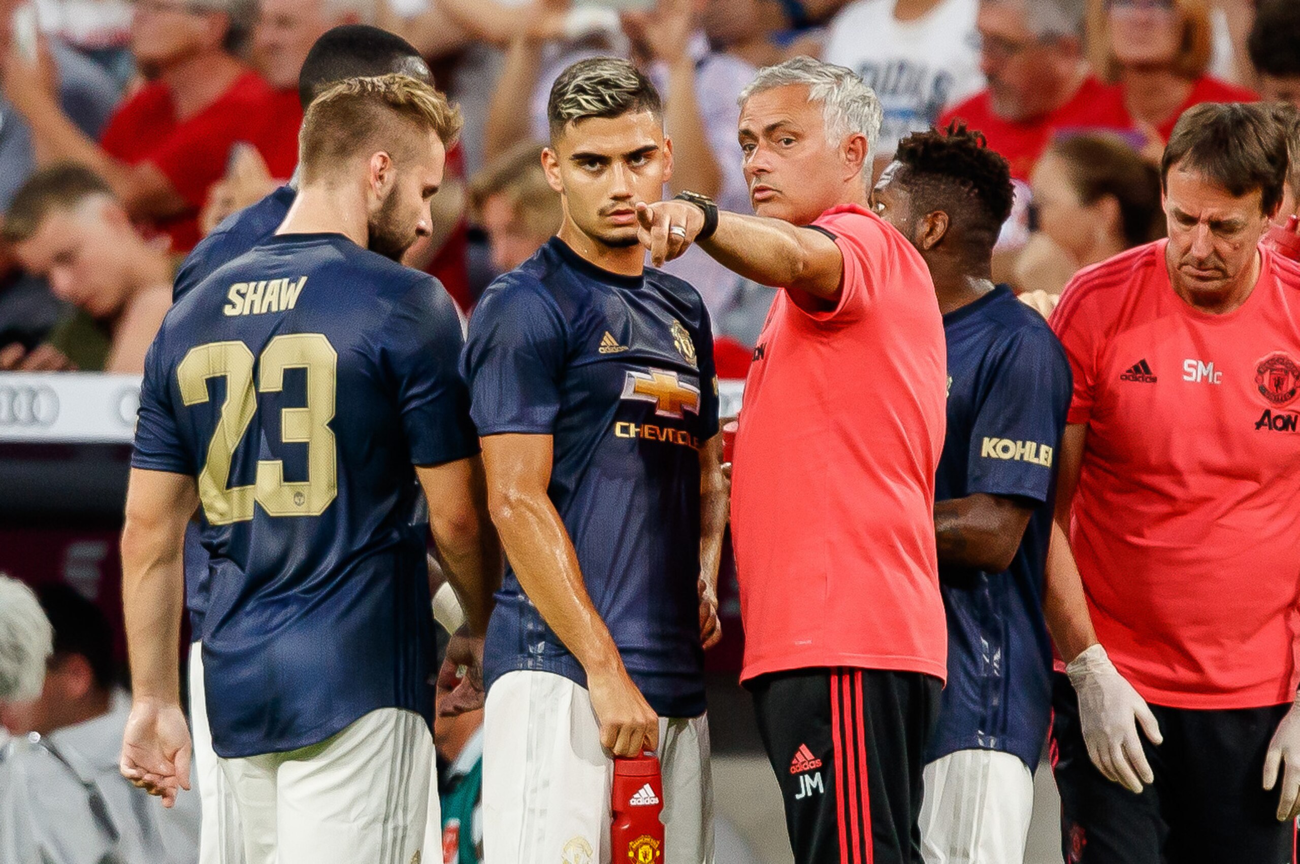 MUNICH, GERMANY - AUGUST 05: Head coach Jose Mourinho of Manchester United speaks with Andreas Pereira of Manchester United during the friendly match between Bayern Muenchen and Manchester United at Allianz Arena on August 5, 2018 in Munich, Germany. (Pho