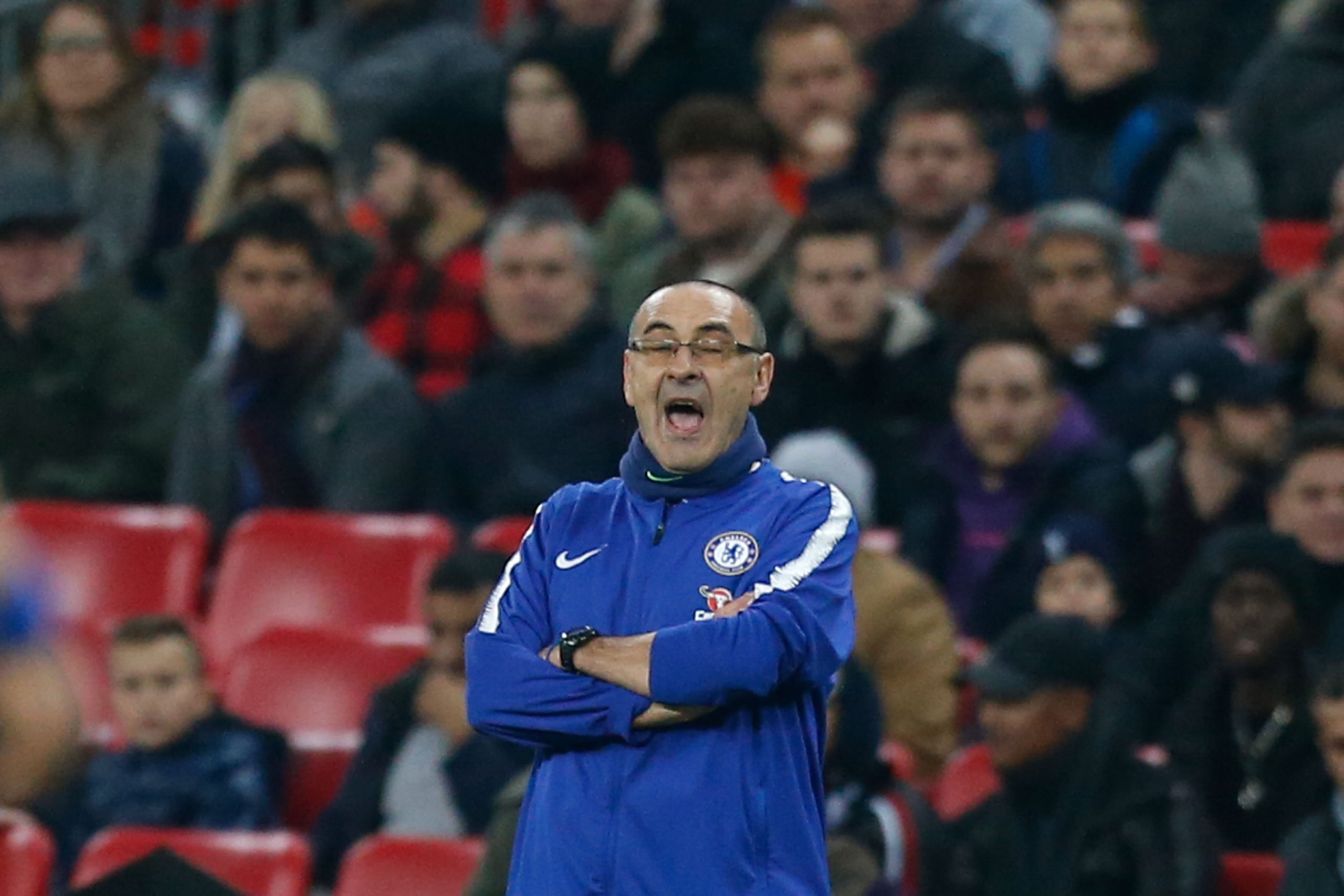Chelsea's Italian head coach Maurizio Sarri gestures from the touchline during the English Premier League football match between Tottenham Hotspur and Chelsea at Wembley Stadium in London, on November 24, 2018. (Photo by Ian KINGTON / various sources / AF
