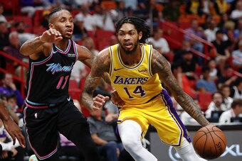 Brandon Ingram drives on Rodney McGruder.