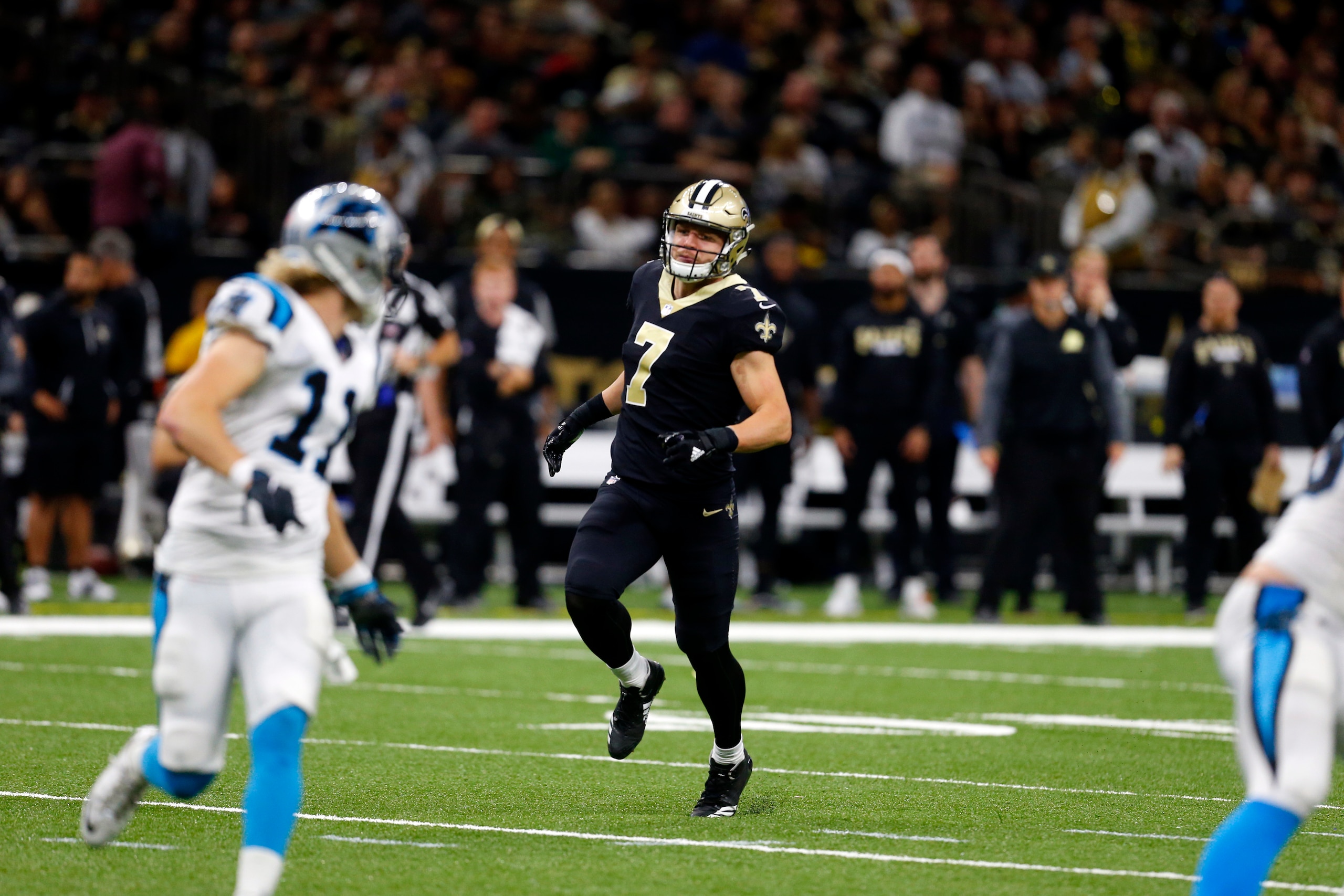 Tayson Hill heads downfield on the kickoff team against the Panthers.
