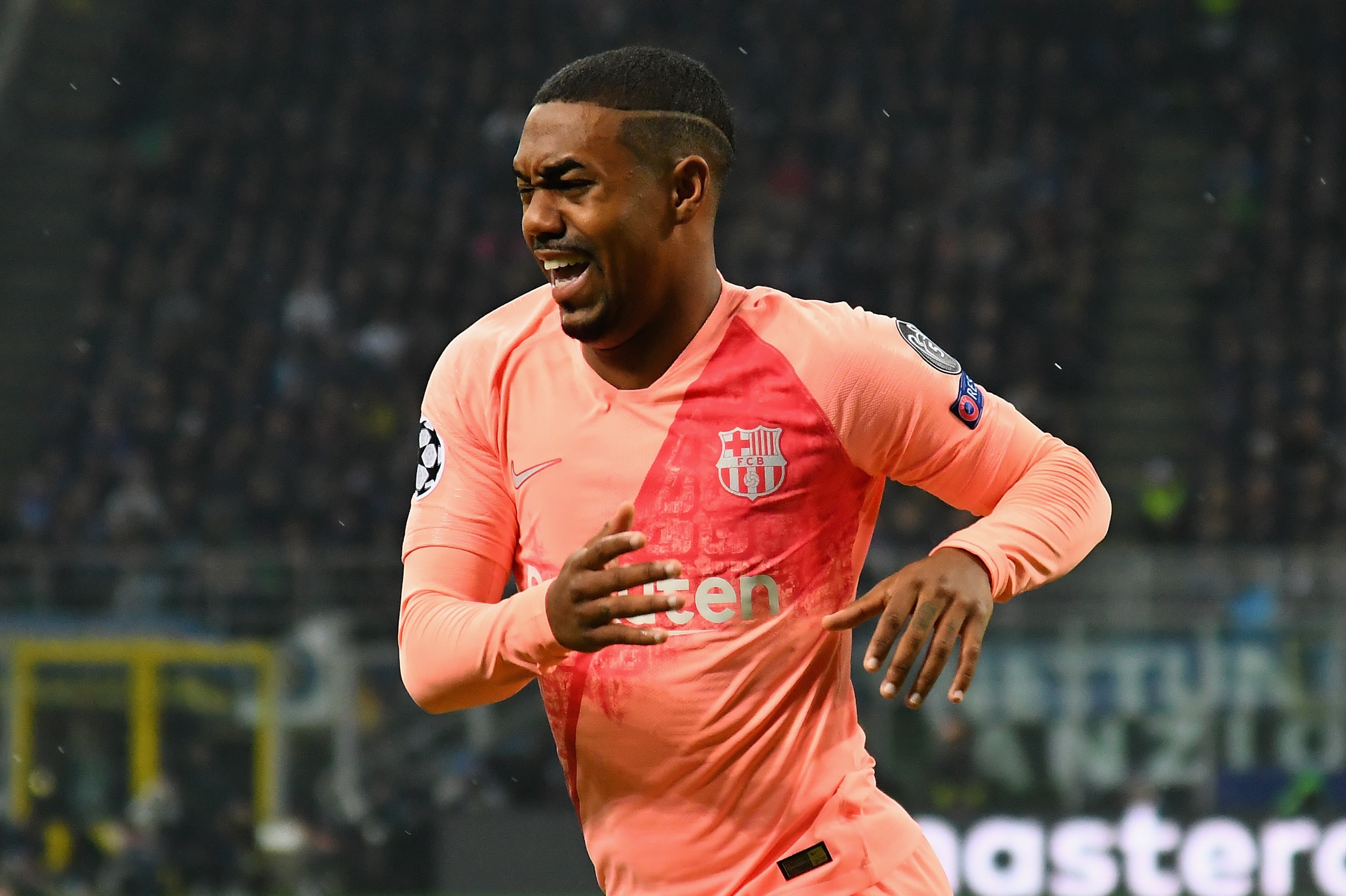 MILAN, ITALY - NOVEMBER 06:  Malcom of FC Barcelona celebrates after scoring the opening goal during the Group B match of the UEFA Champions League between FC Internazionale and FC Barcelona at San Siro Stadium on November 6, 2018 in Milan, Italy.  (Photo
