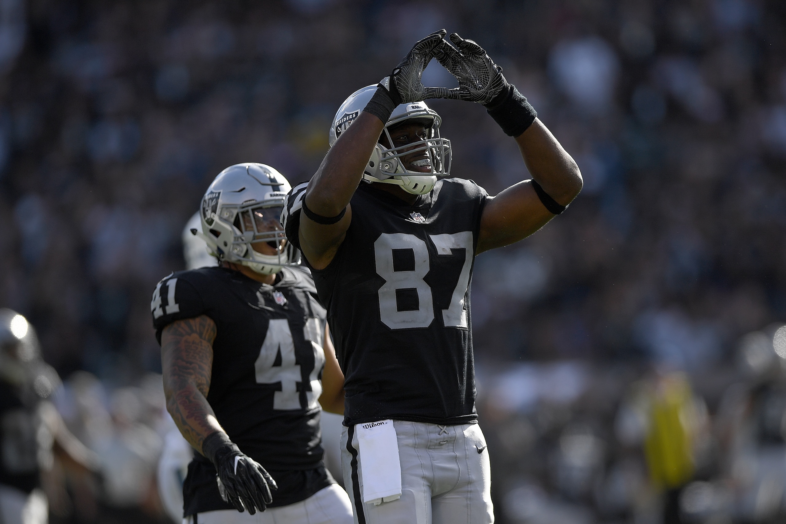 OAKLAND, CA - OCTOBER 28: Jared Cook #87 of the Oakland Raiders celebrates after catching a long pass for a firs down against the Indianapolis Colts during the second half of their NFL football game at Oakland-Alameda County Coliseum on October 28, 2018 OAKLAND, CA - OCTOBER 28: Jared Cook #87 of the Oakland Raiders celebrates after catching a long pass for a firs down against the Indianapolis Colts during the second half of their NFL football game at Oakland-Alameda County Coliseum on October 28, 2018